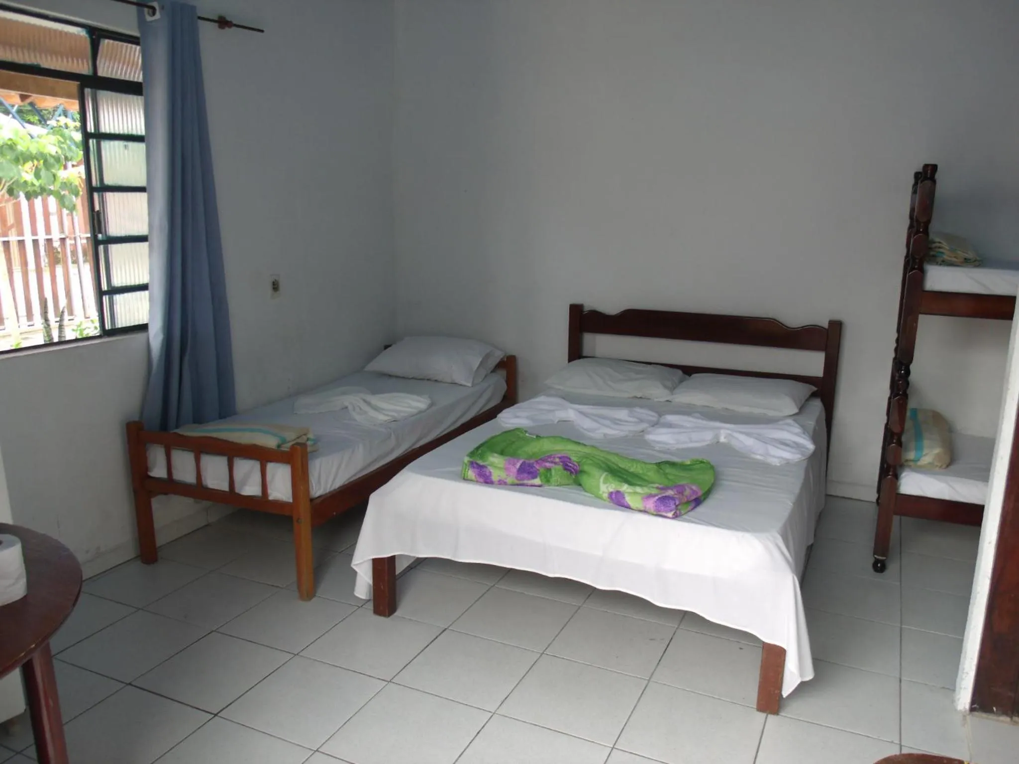 Bed in Pousada Edson
