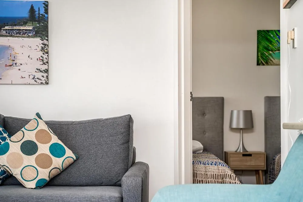 Seating area in Rainbow Bay Resort Holiday Apartments