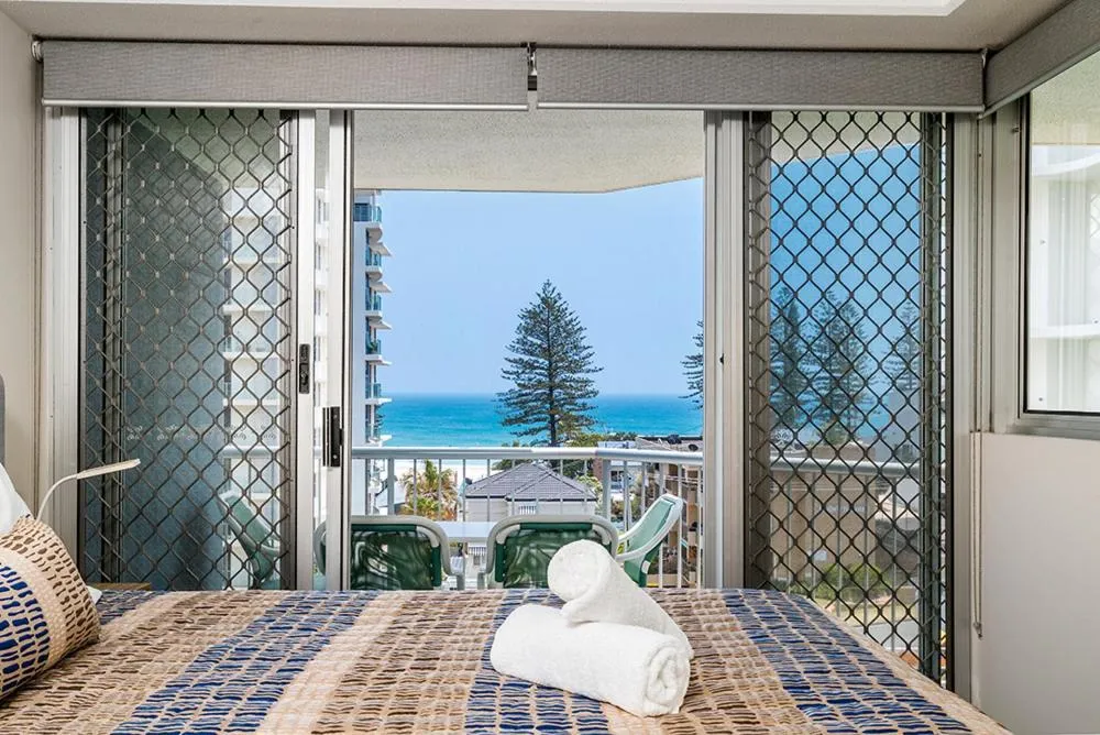Balcony/Terrace, Bed in Rainbow Bay Resort Holiday Apartments
