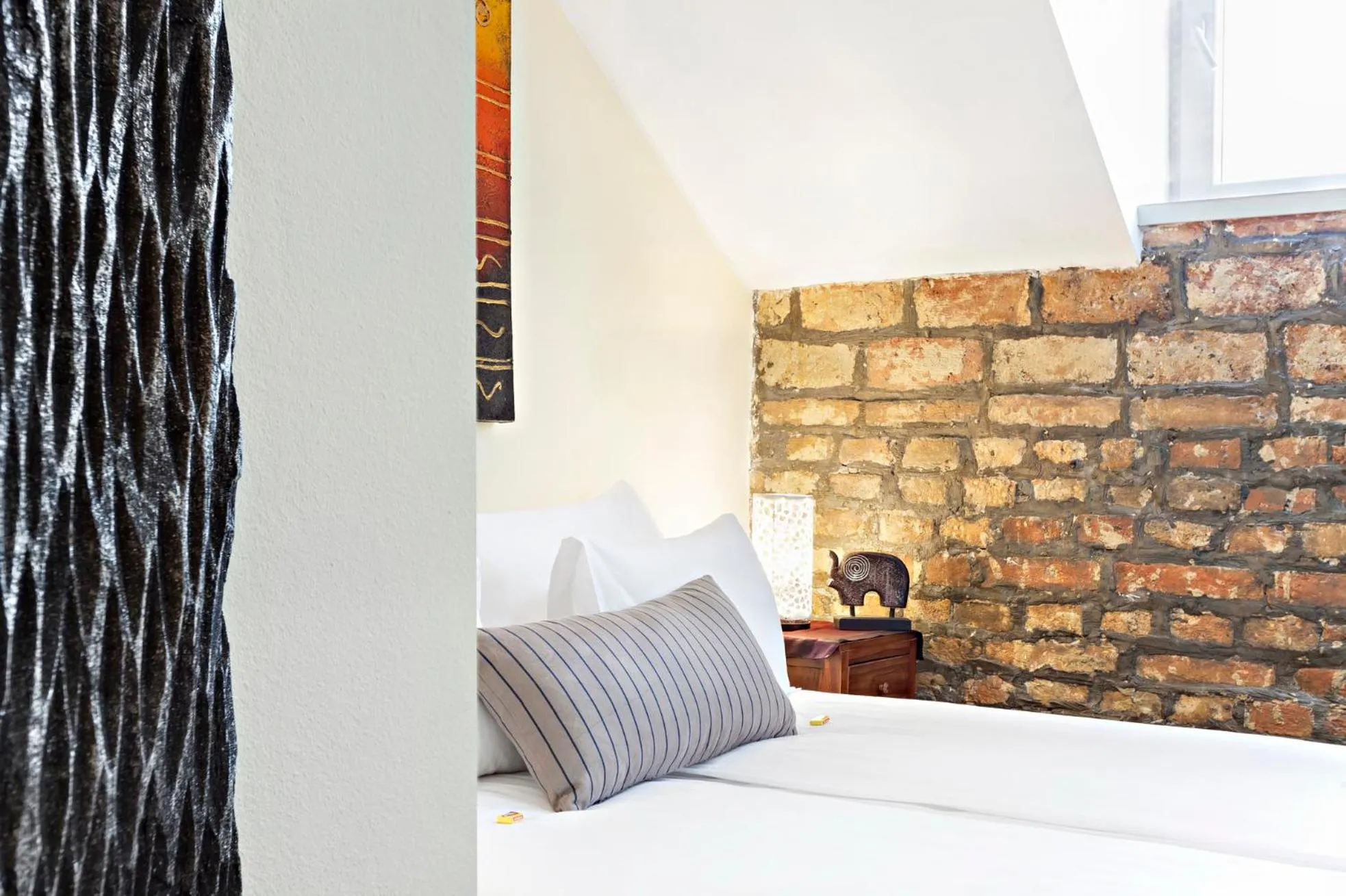 Bed in SuperB Luxury Suites