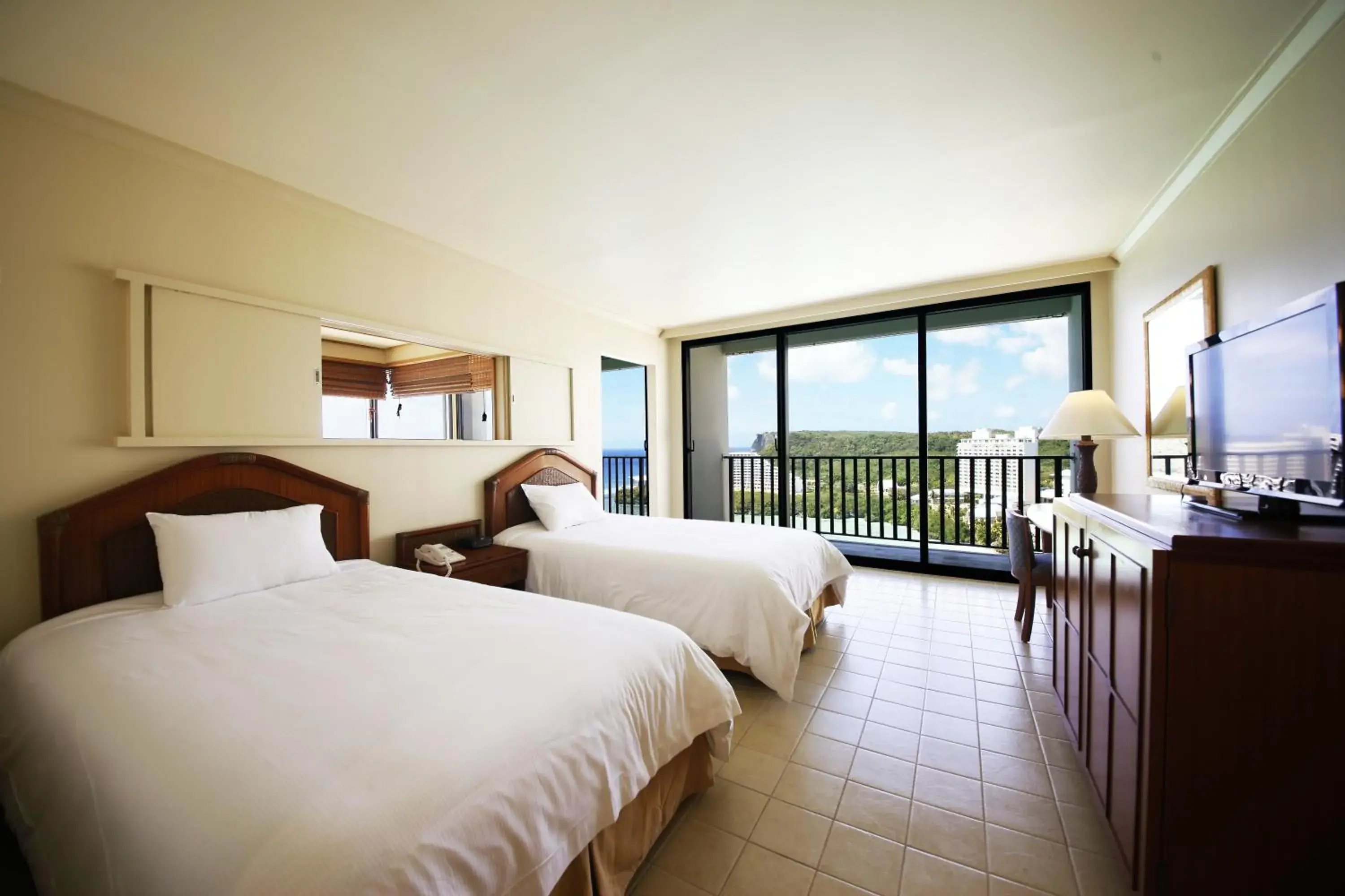 Photo of the whole room, Bed in Guam Reef Hotel Photo of the whole room, Bed in Guam Reef Hotel