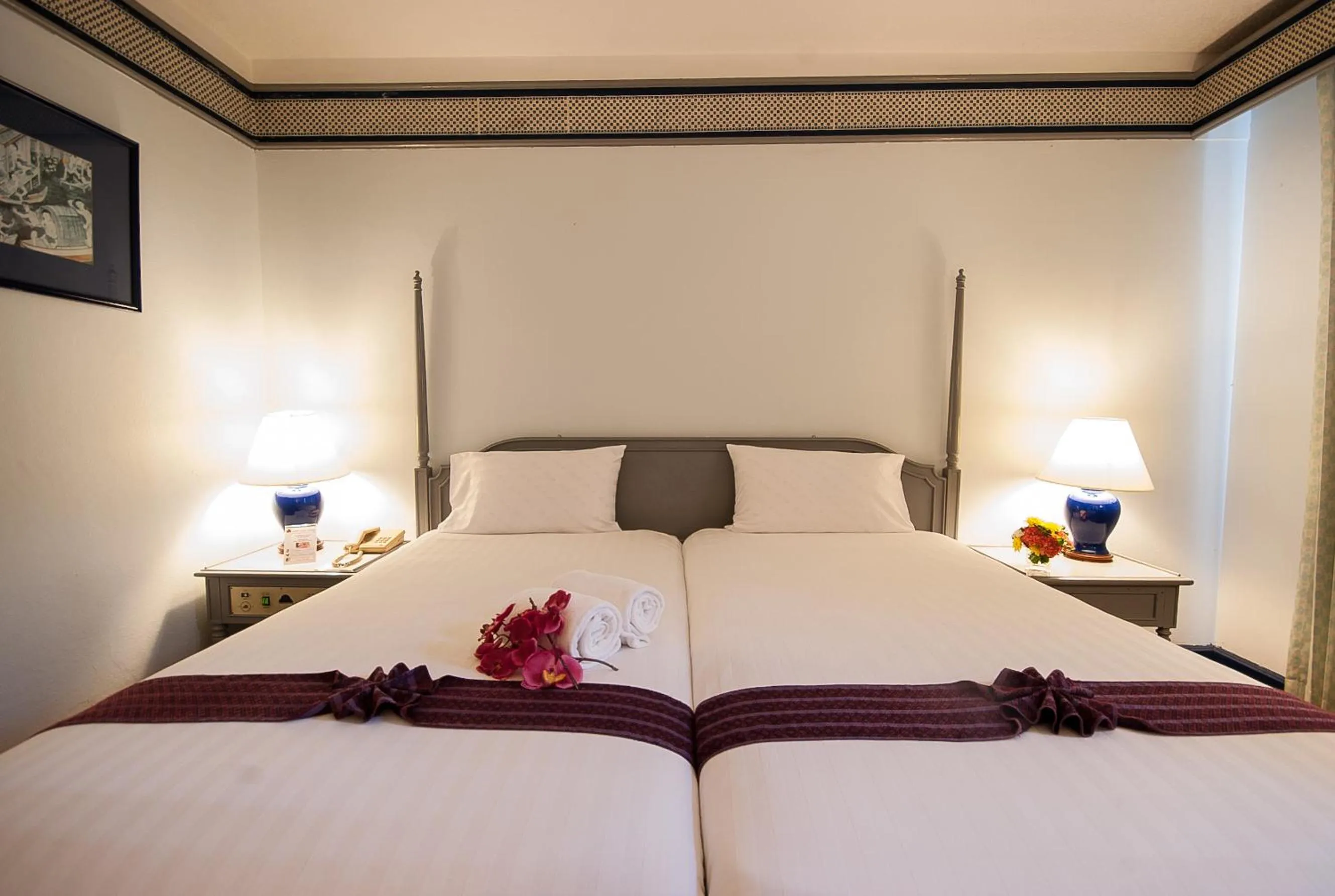 Bed in Diamond Plaza Hotel