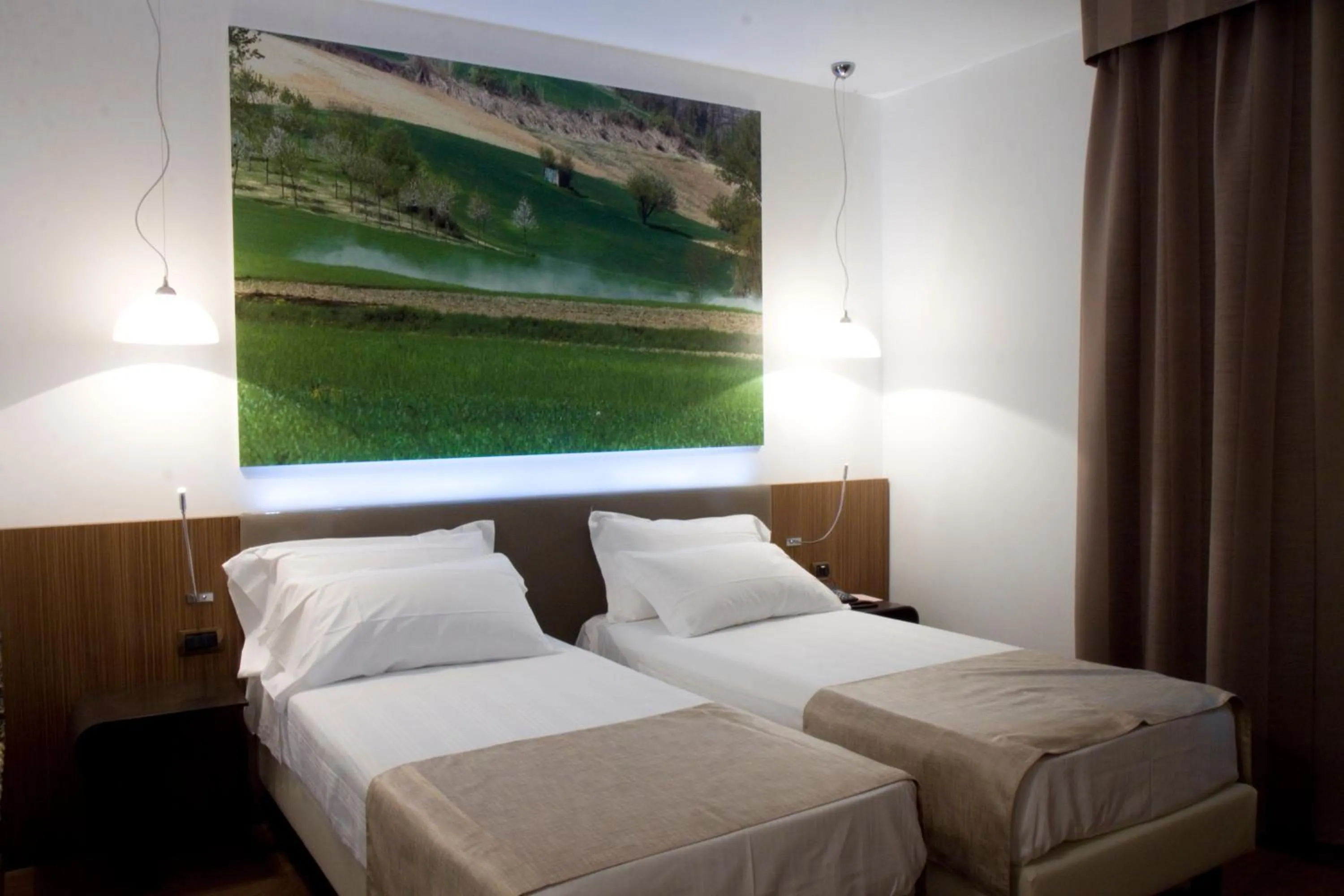 Bed in HM MotelHotel