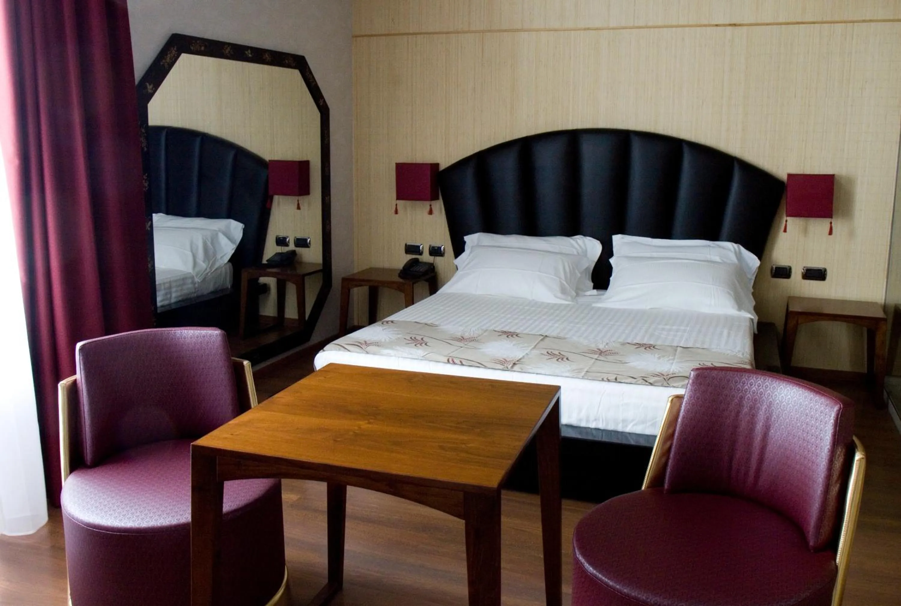 Bed in HM MotelHotel