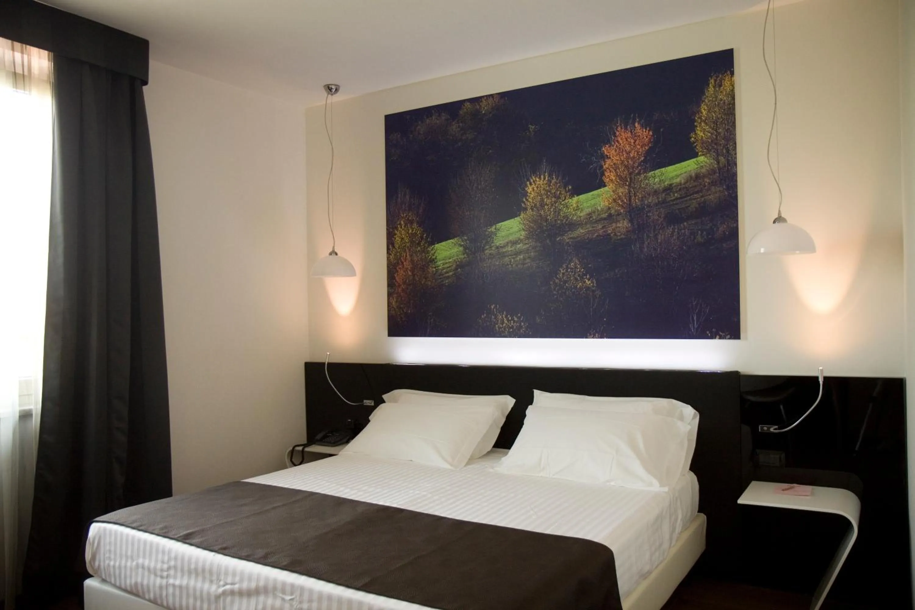 Bed in HM MotelHotel