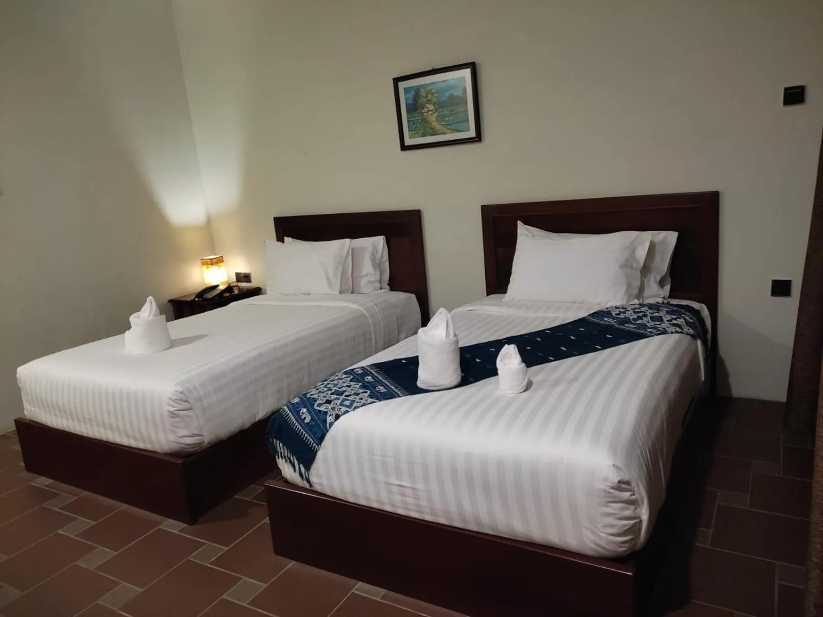 Bed in Saksiri Riverside Boutique Hotel