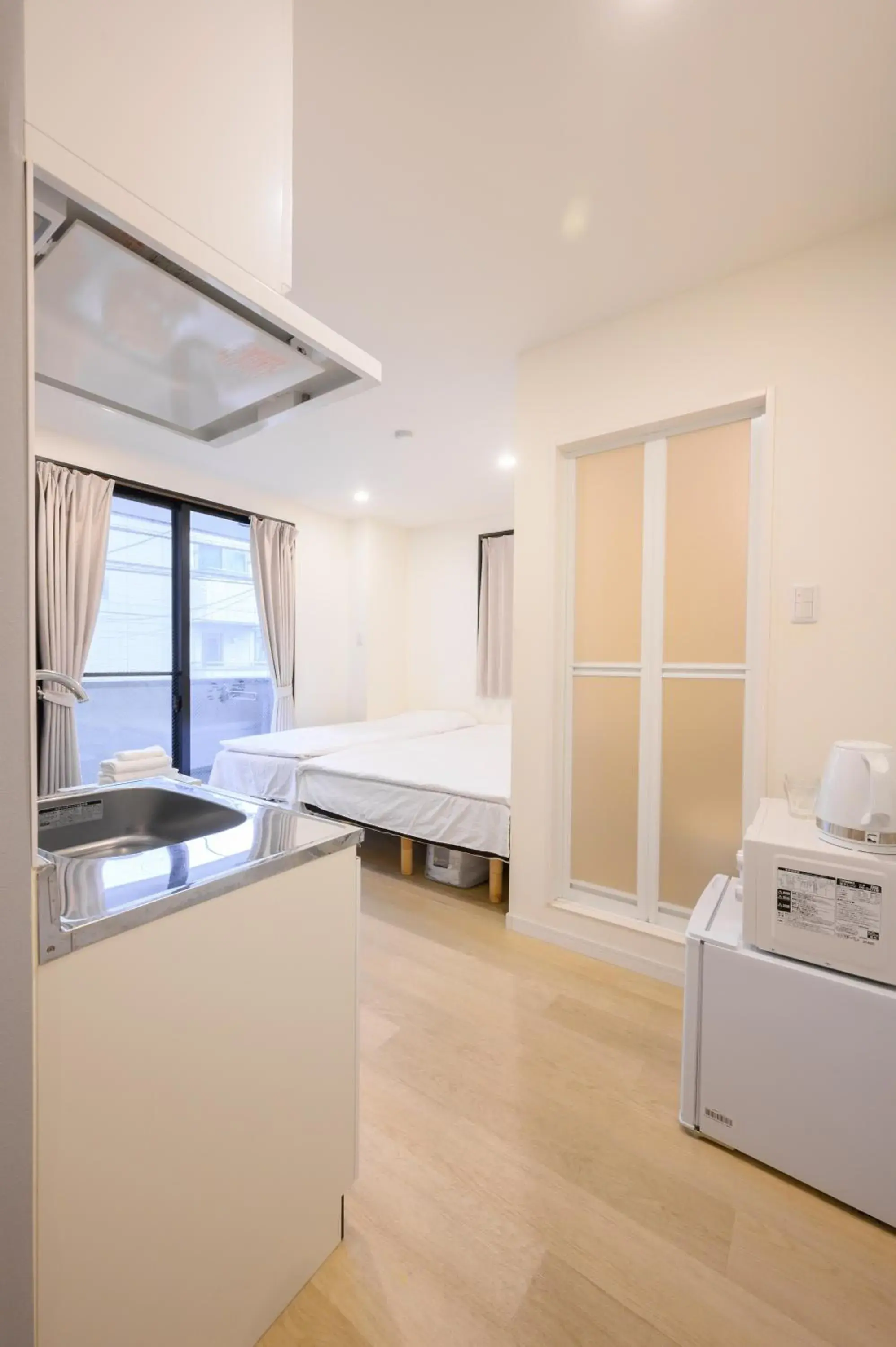 Family Room with Bathroom - single occupancy in Oku Apartment Family Room with Bathroom - single occupancy in Oku Apartment