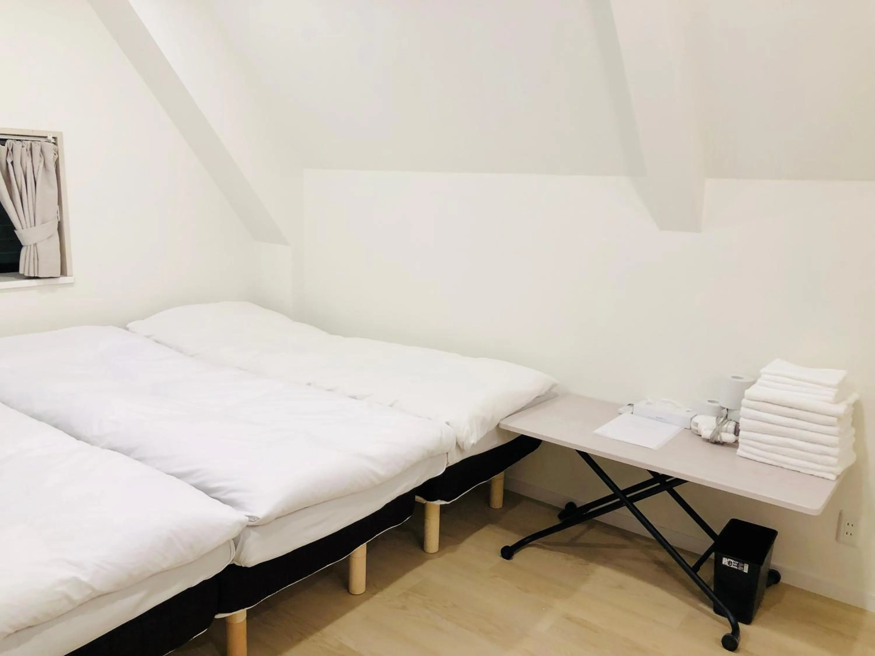 Bed in Oku Apartment