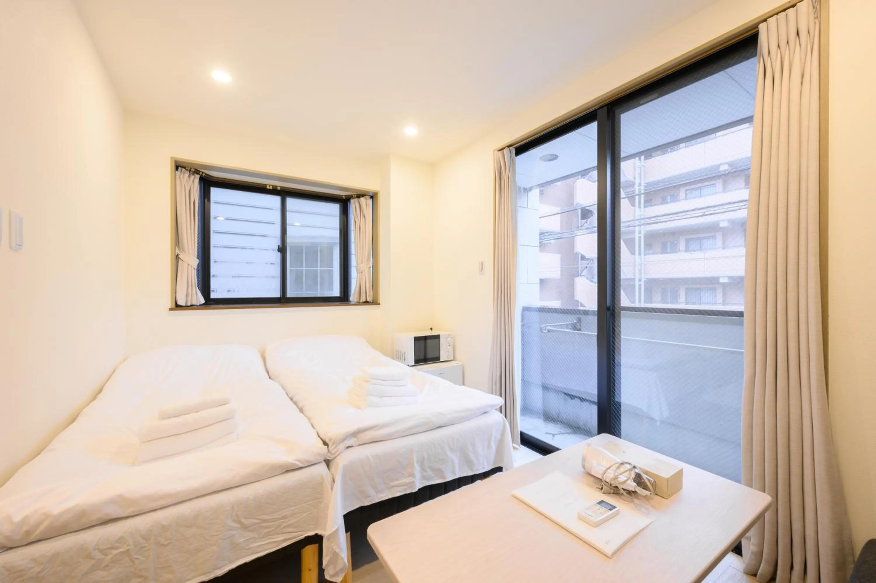 Bed in Oku Apartment