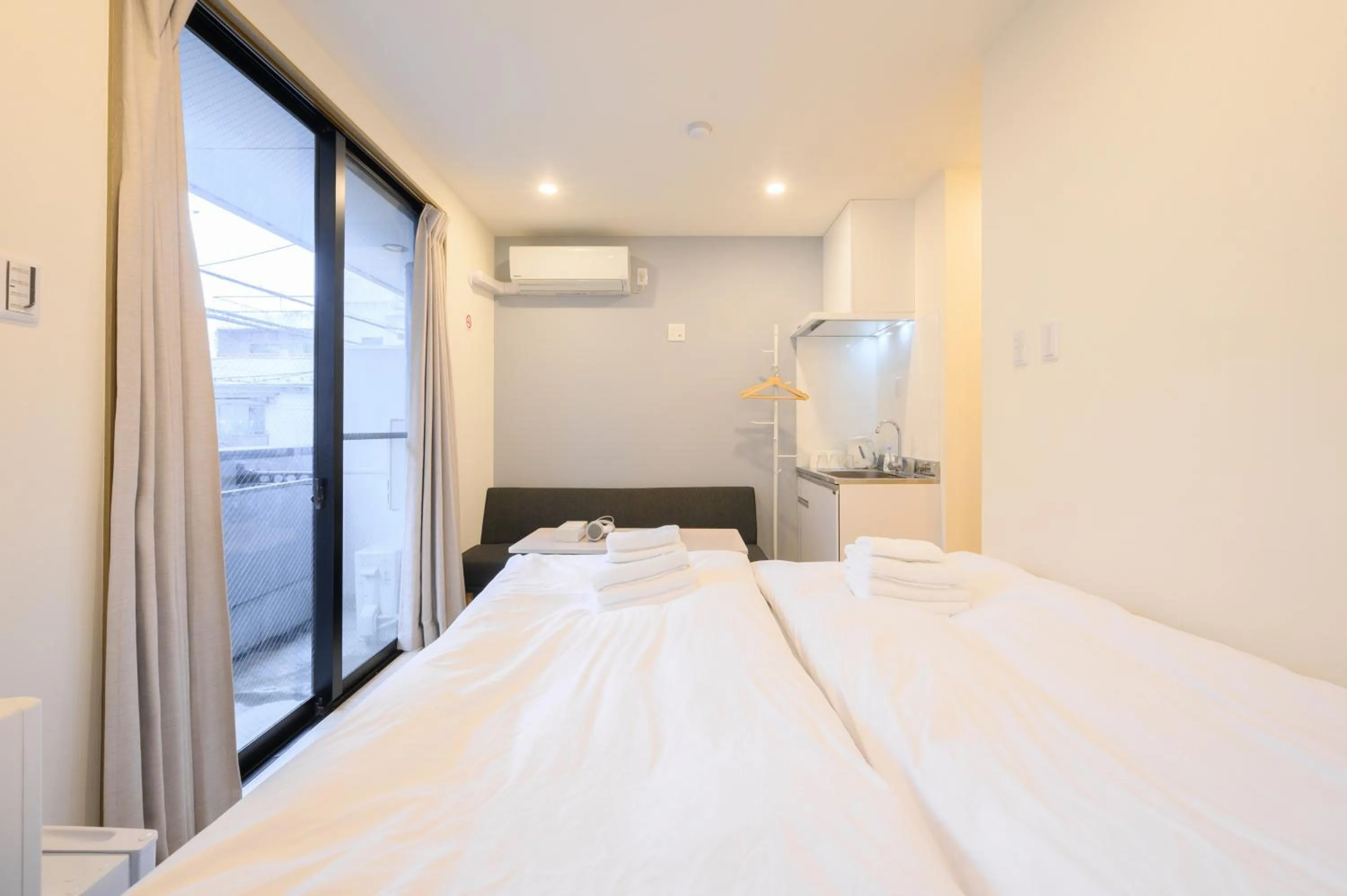 Bed in Oku Apartment