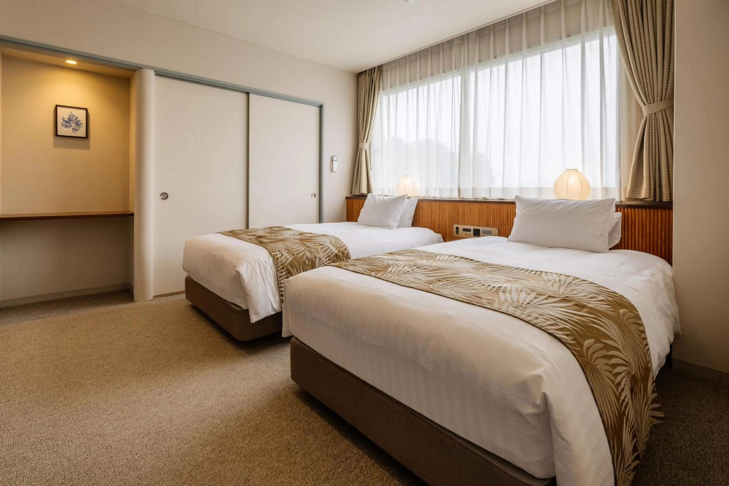 Bed in Infinito Hotel and Spa