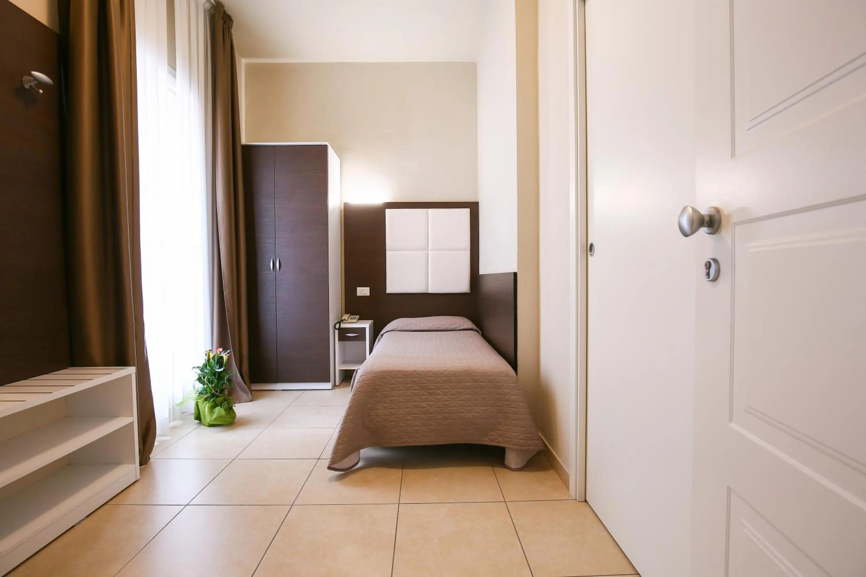 Photo of the whole room, Bed in Hotel Bergamo