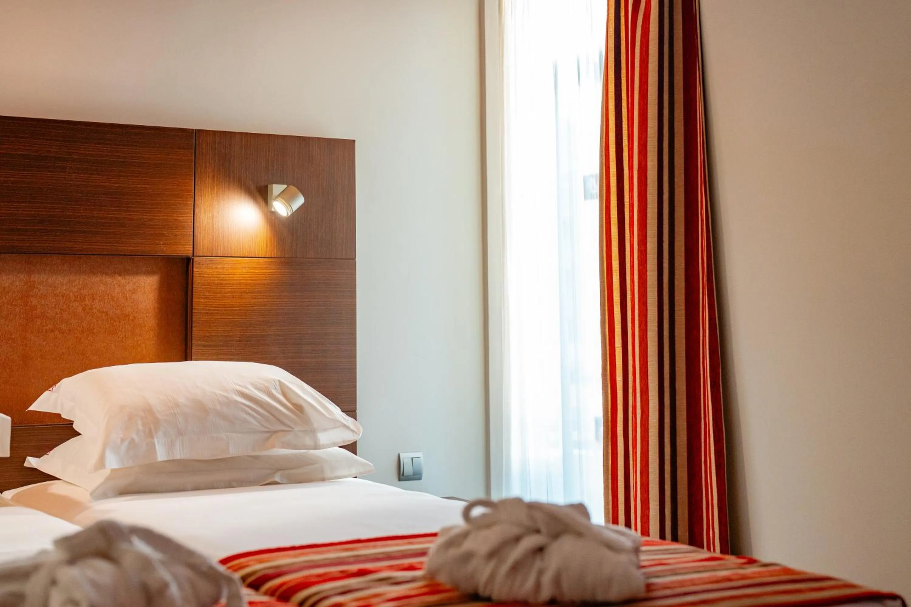 Bed in Muthu Raga Madeira Hotel