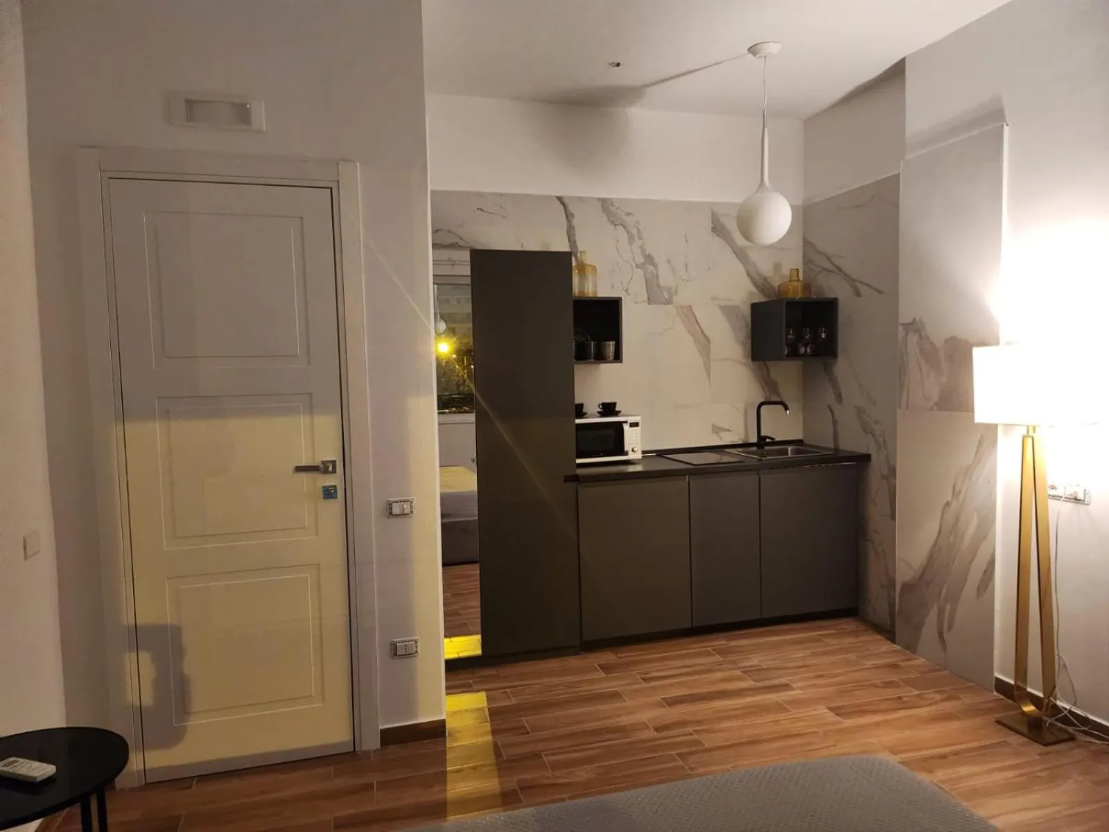 Kitchen or kitchenette in B&B Mini Hotel Incity-close train station and port-