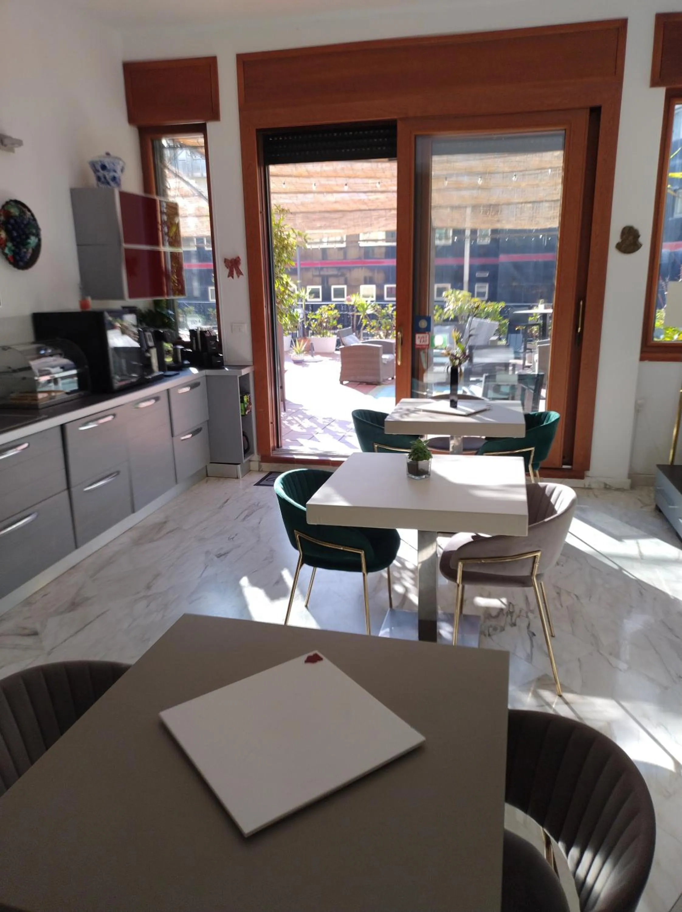 Kitchen or kitchenette in B&B Mini Hotel Incity-close train station and port-