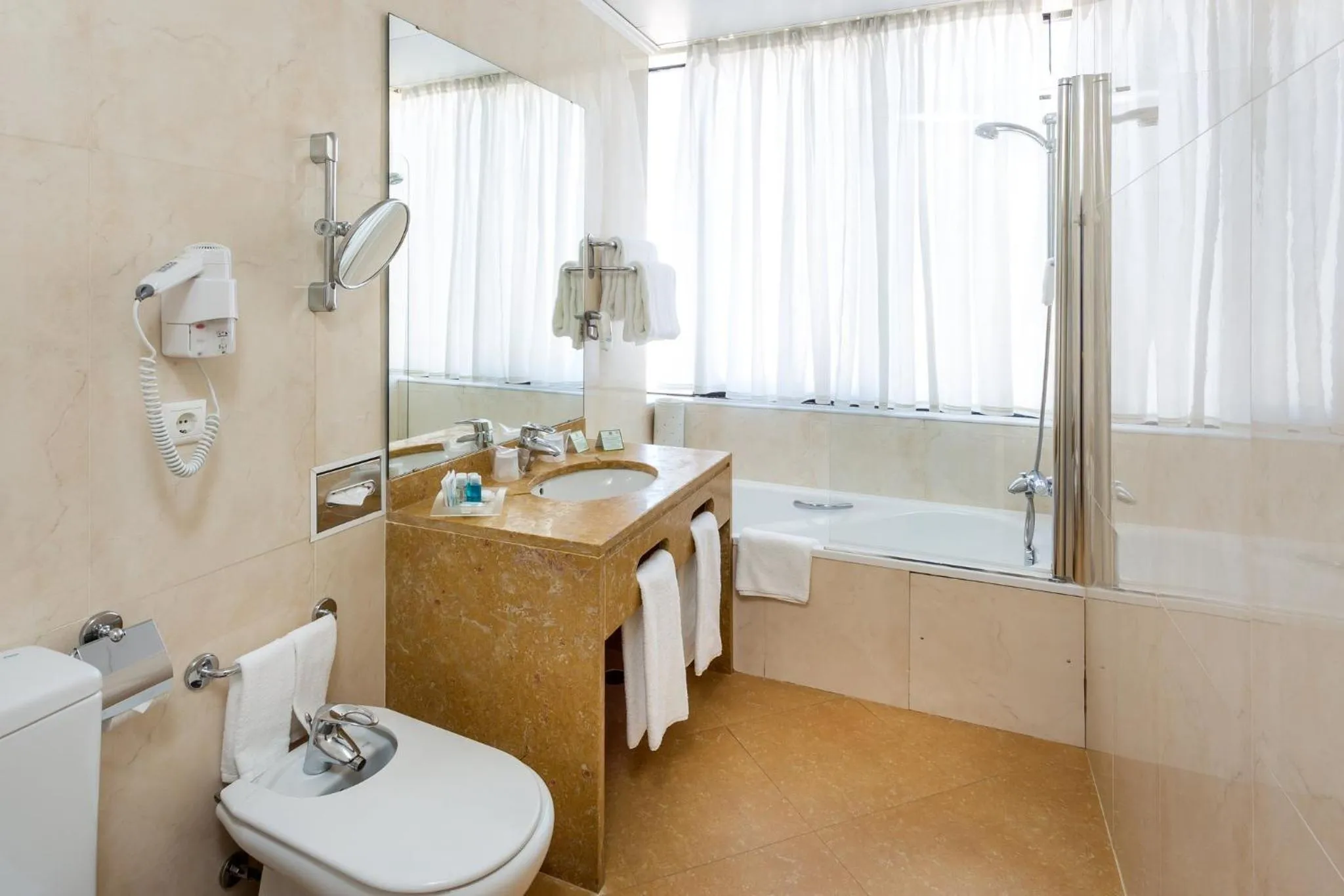 Bathroom in Holiday Inn Lisbon by IHG