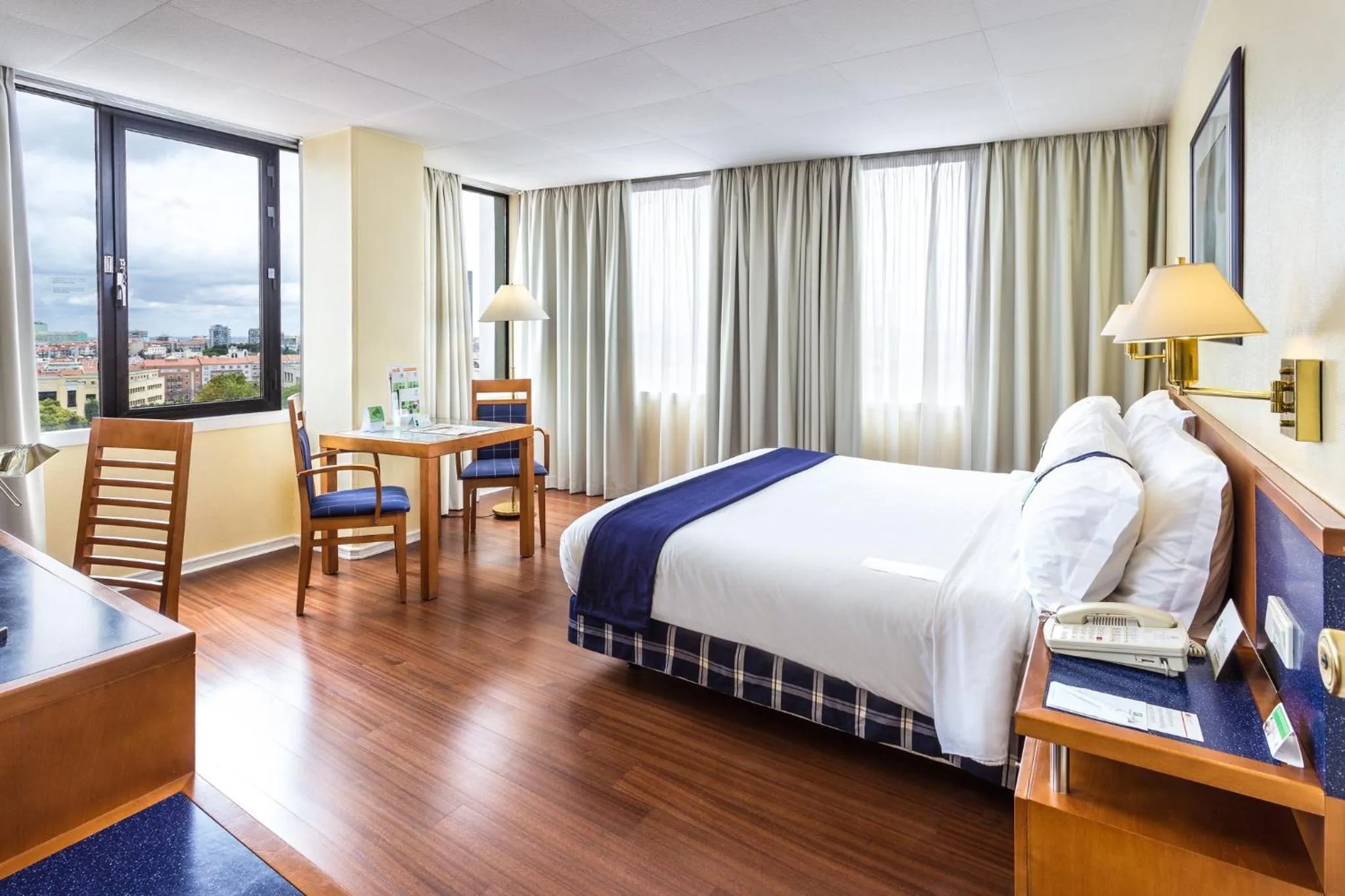 Photo of the whole room, Bed in Holiday Inn Lisbon by IHG