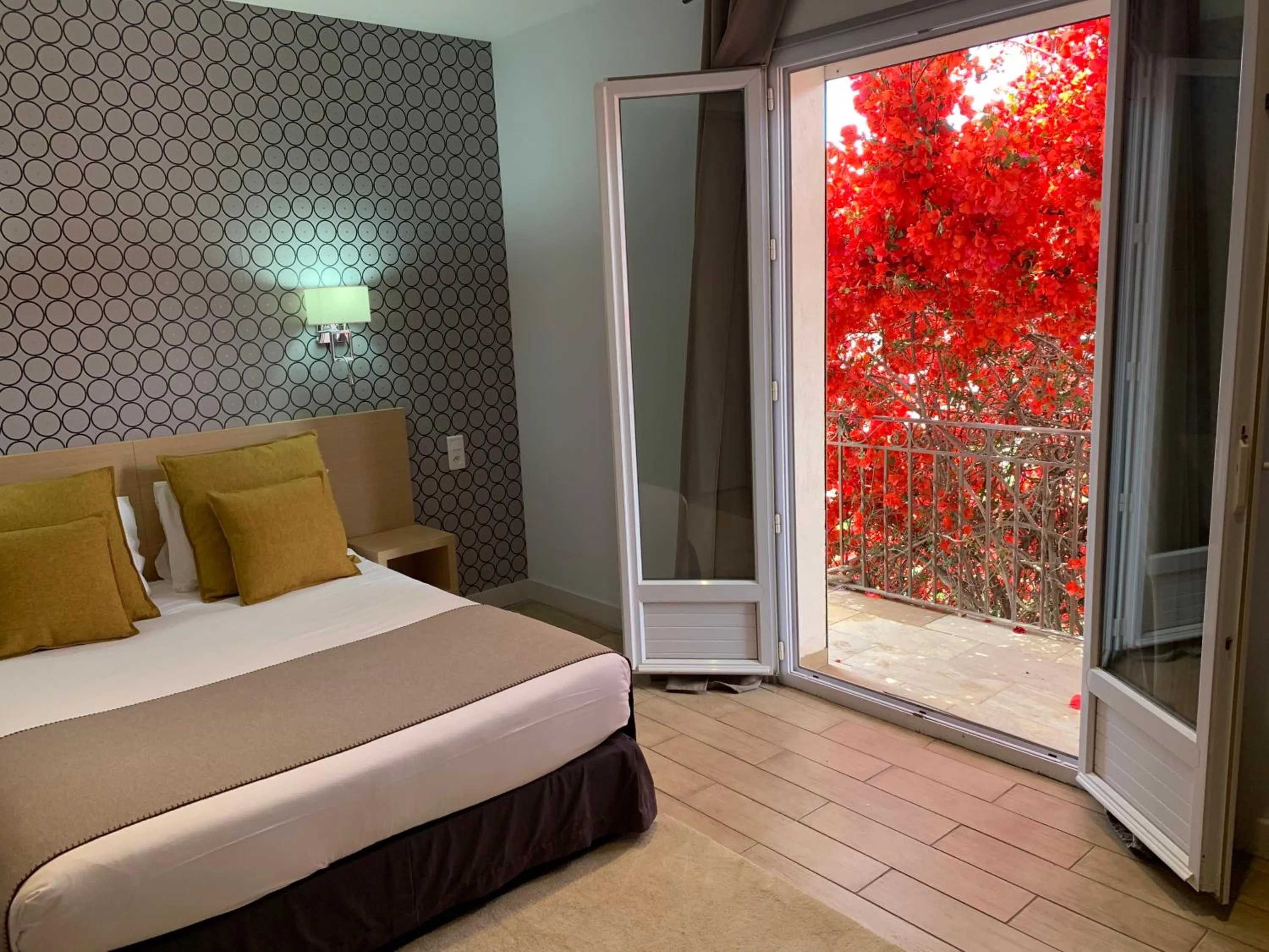 Photo of the whole room, Bed in Hôtel Le Mistral