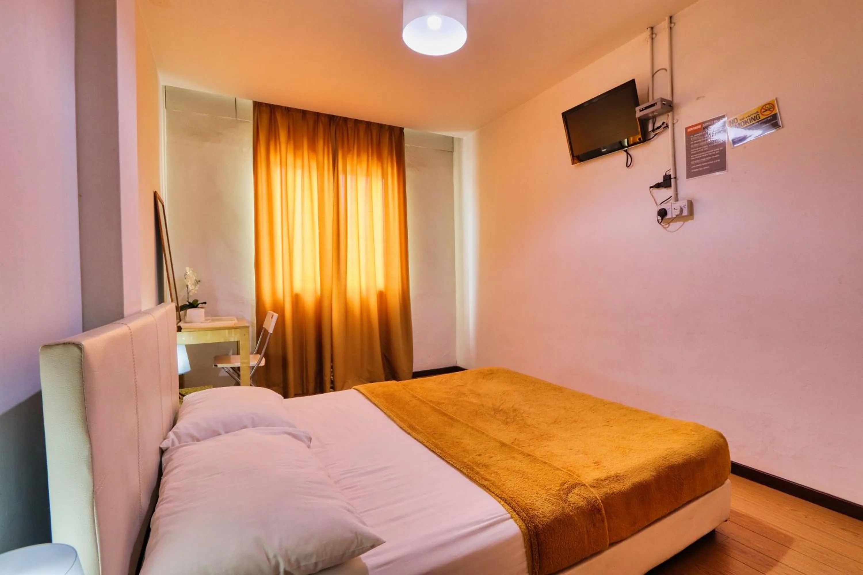 Bed in Bata Merah Boutique Hotel