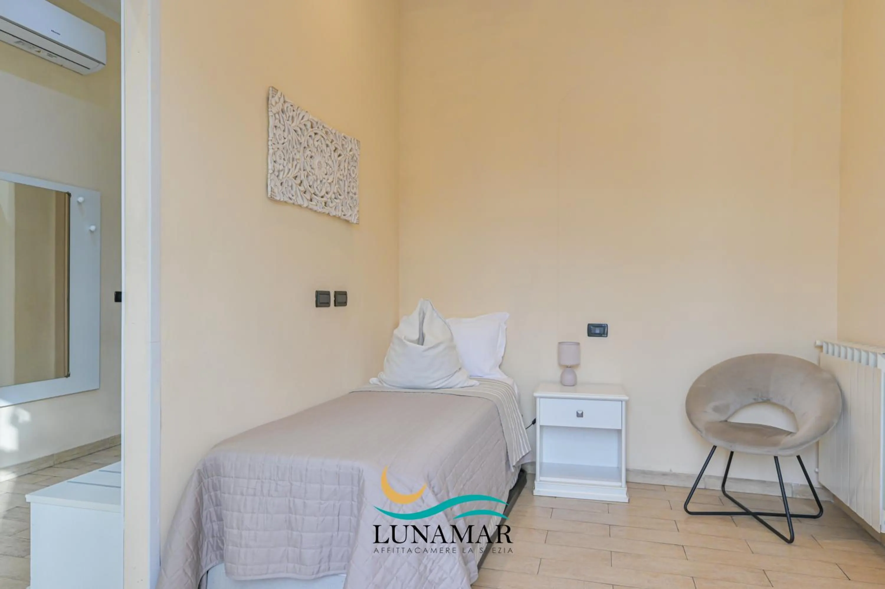 Bed in Affittacamere Lunamar