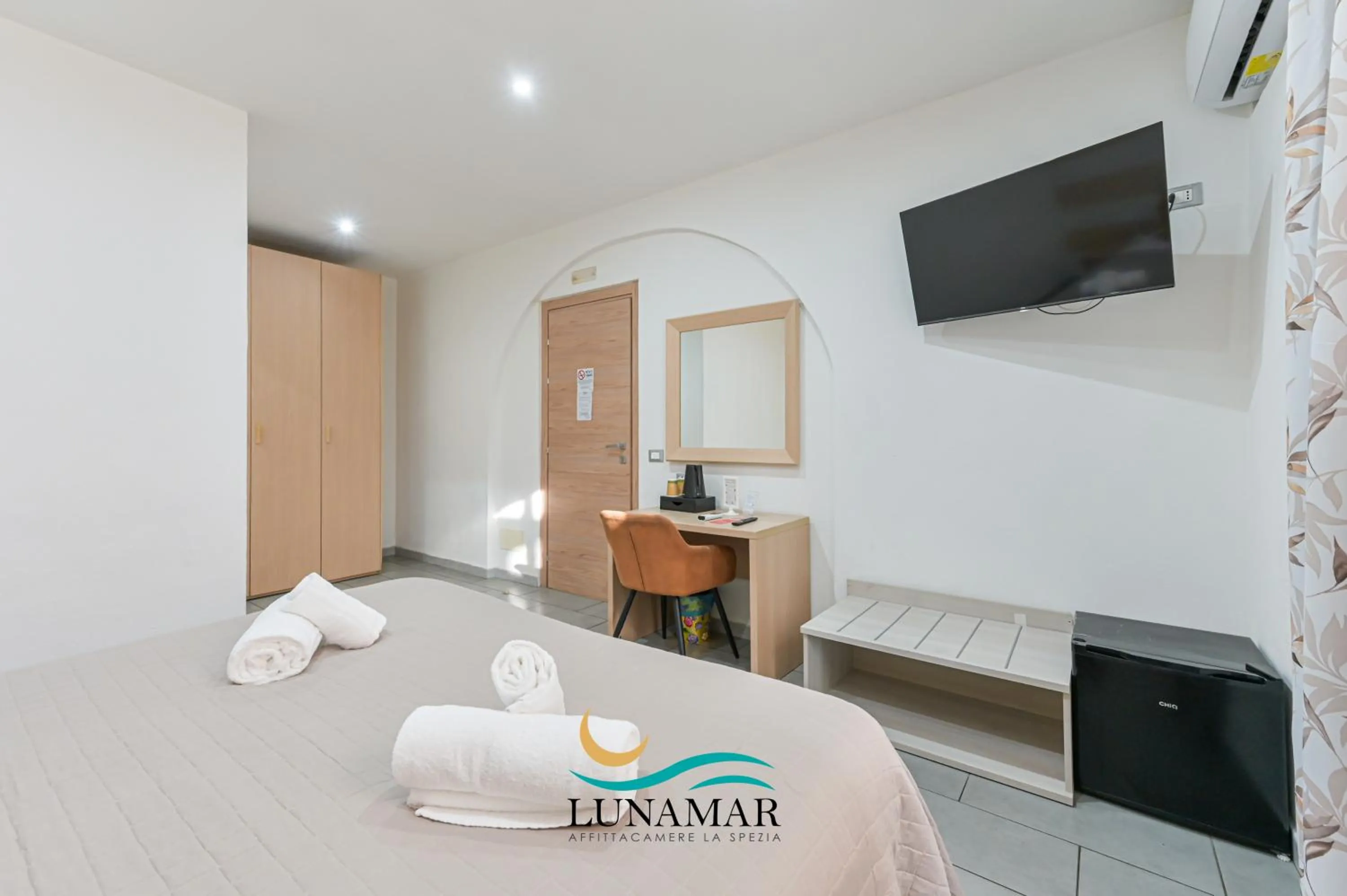 Bed in Affittacamere Lunamar