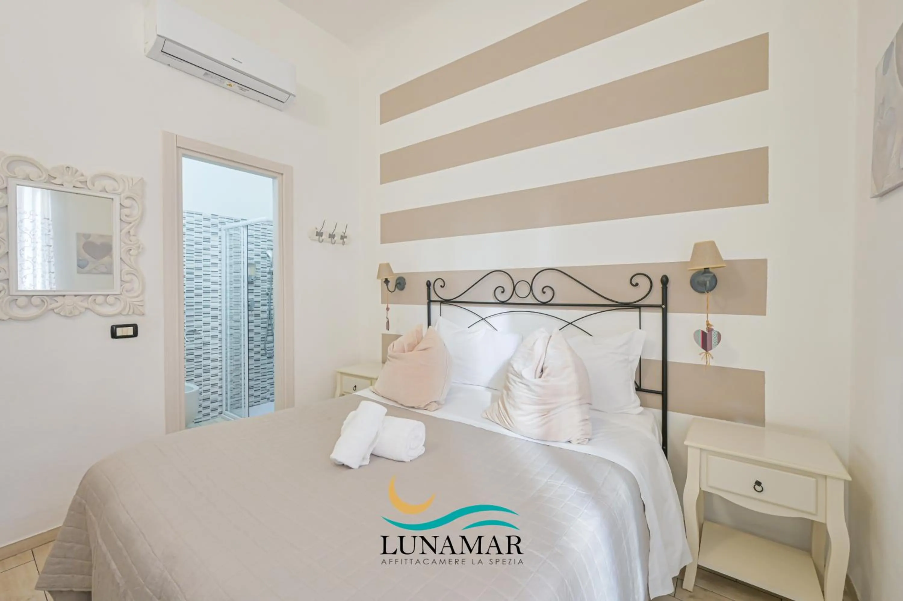 Bed in Affittacamere Lunamar