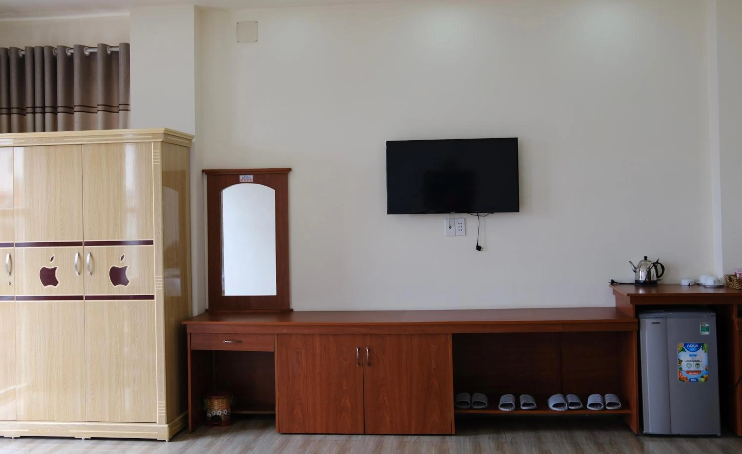 Communal lounge/ TV room in Kim Ngân Hotel Buôn Ma Thuột