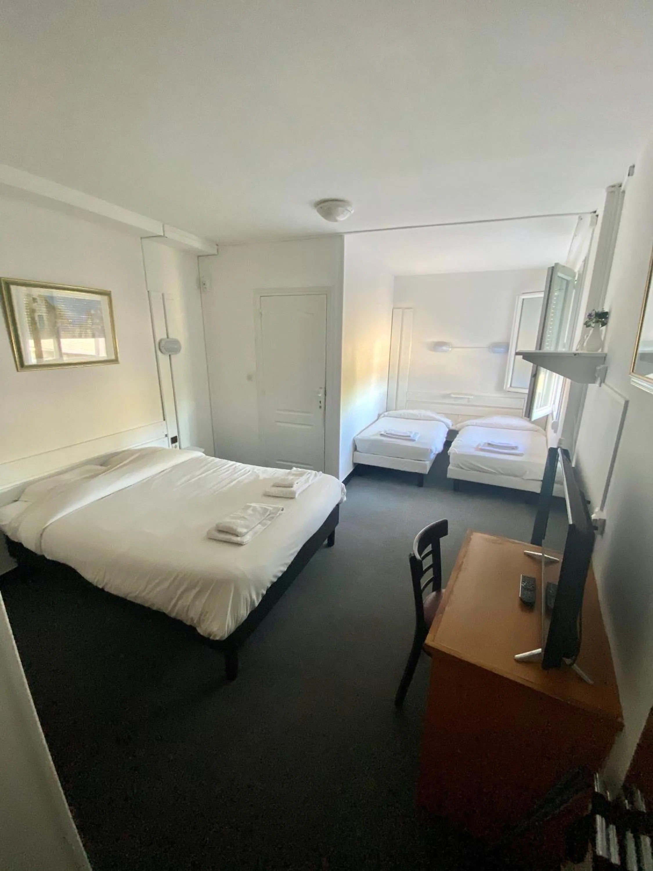 Photo of the whole room, Bed in Hotel du Centre Lucé Chartres