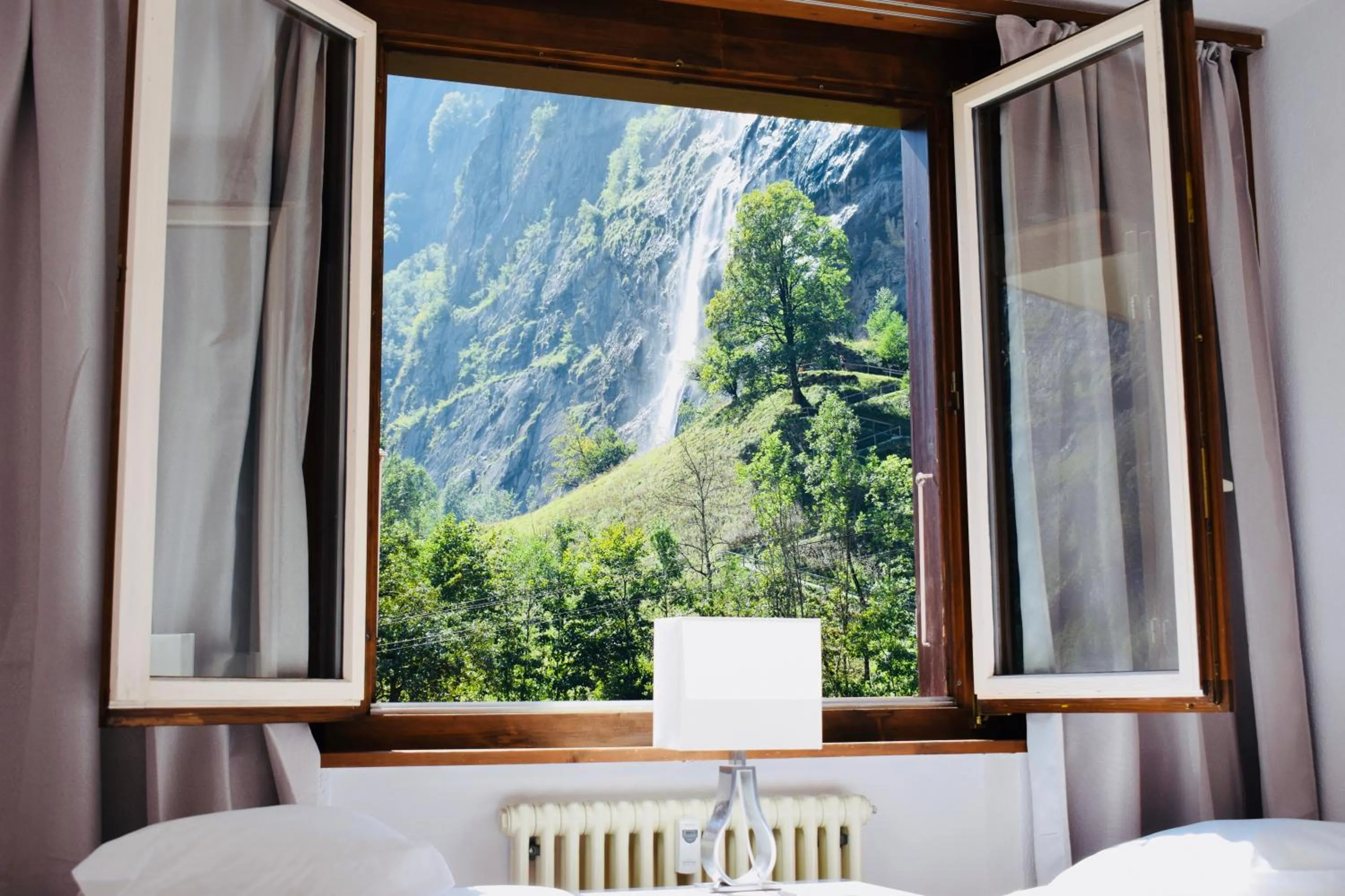 Bed in Breathtaking Waterfall Apartment