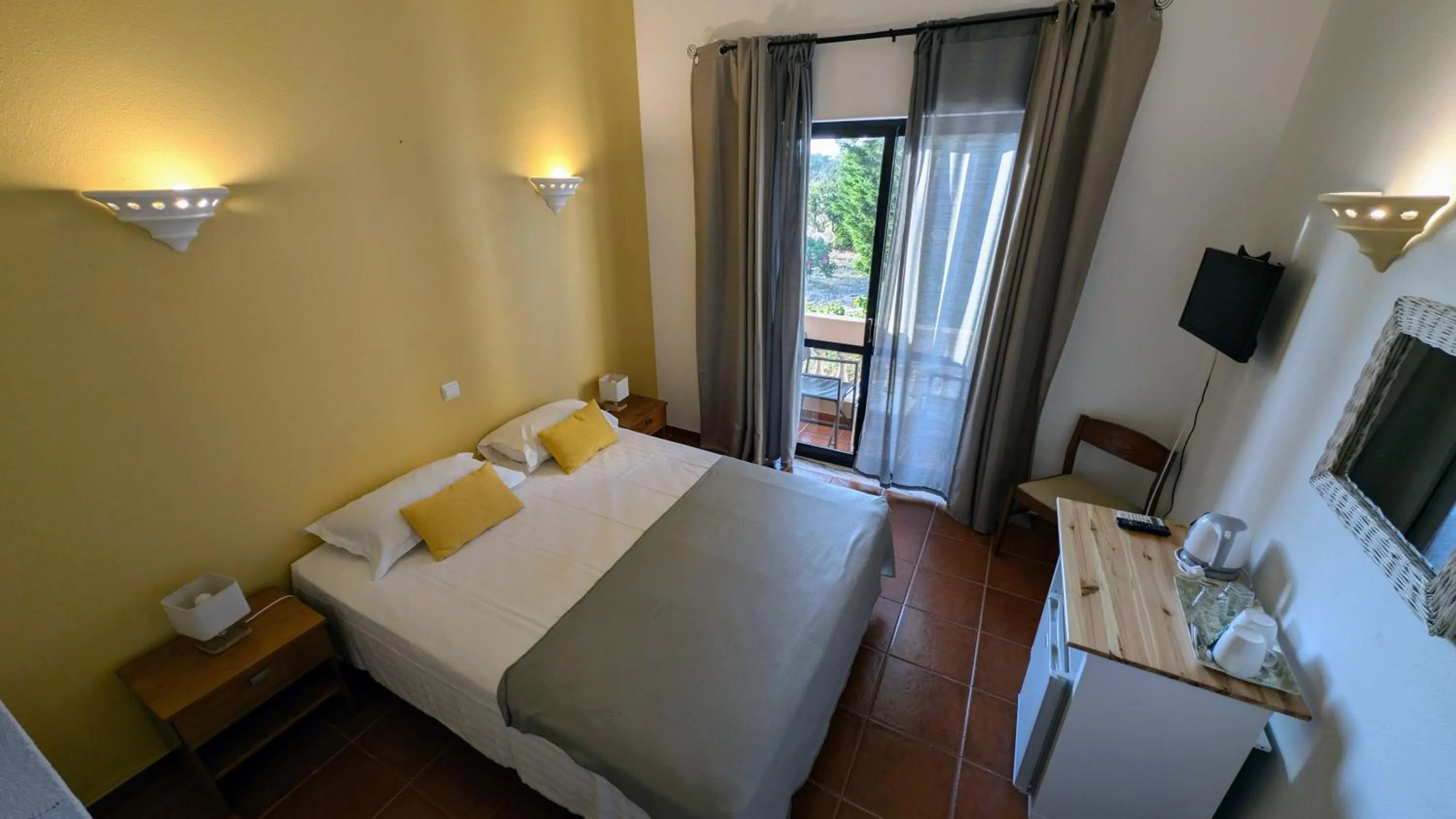 Bed in Casa Rosa Montes