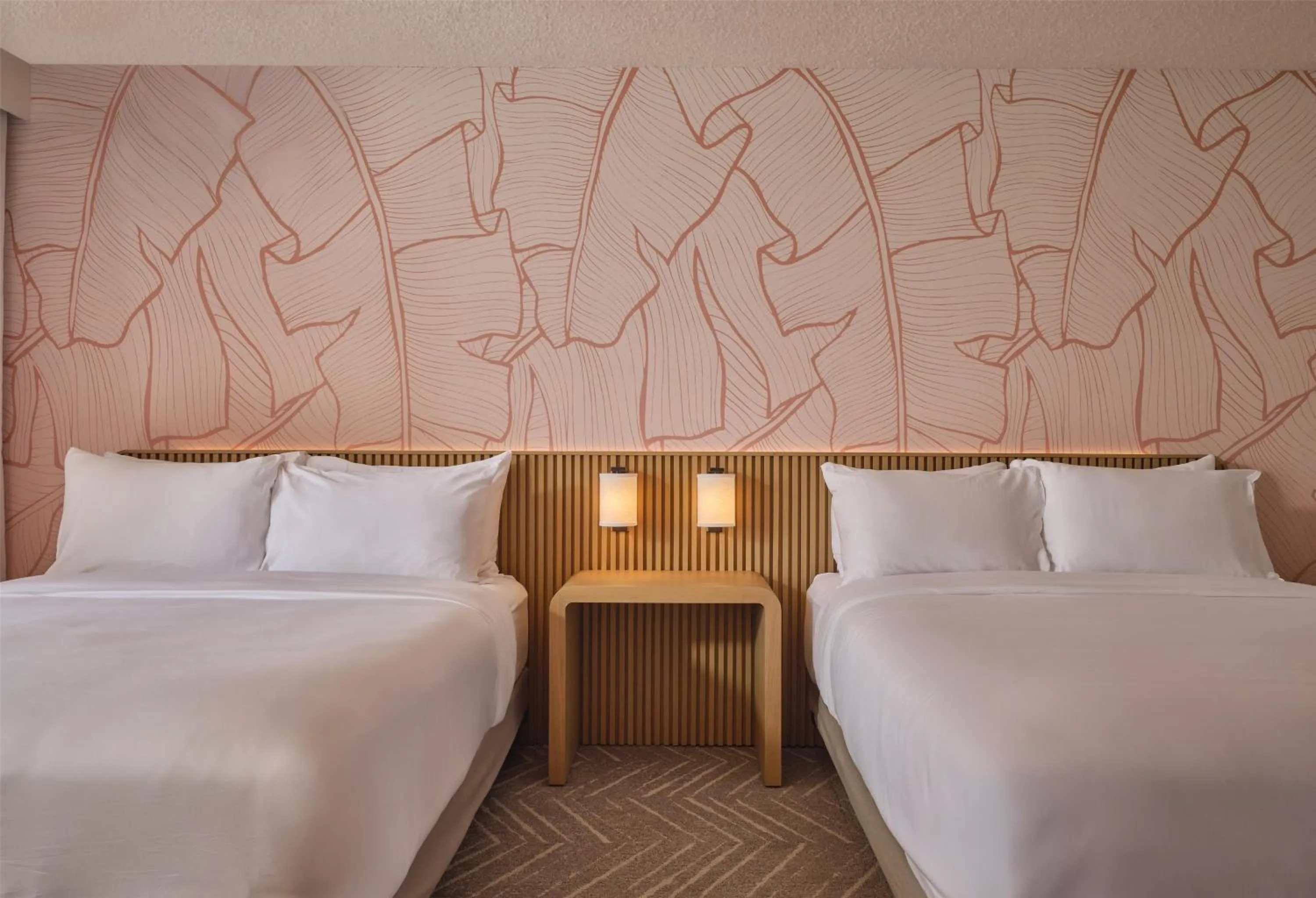 Bed in The Ambassador of Waikiki, Tapestry Collection by Hilton