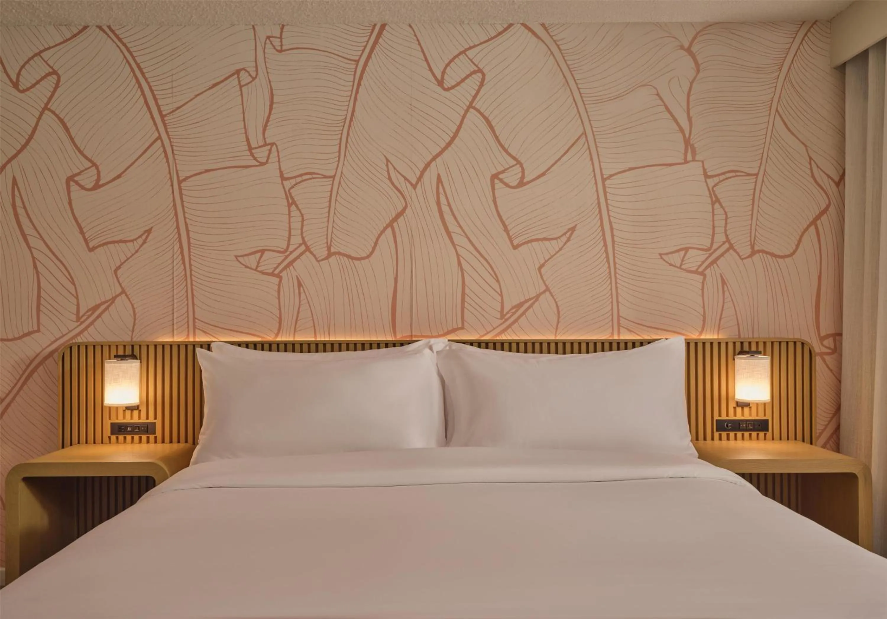 Bed in The Ambassador of Waikiki, Tapestry Collection by Hilton