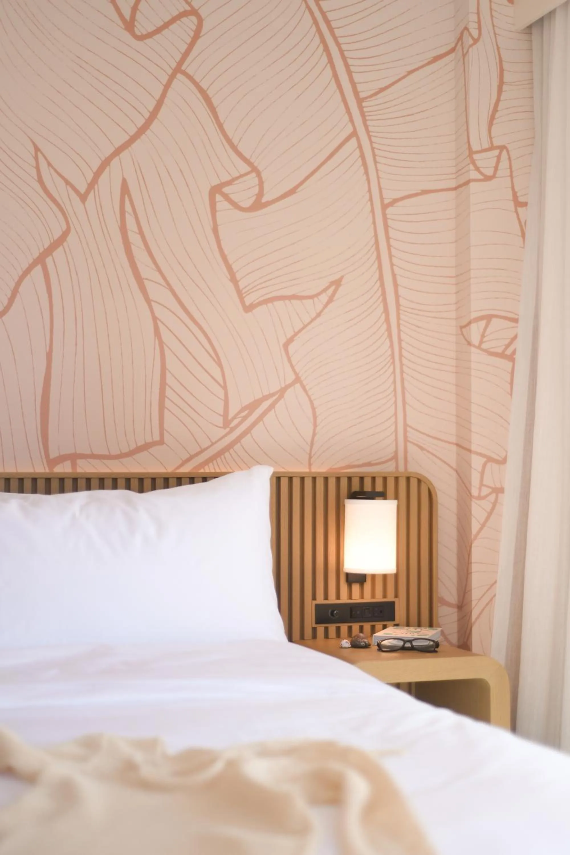 Bed in The Ambassador of Waikiki, Tapestry Collection by Hilton