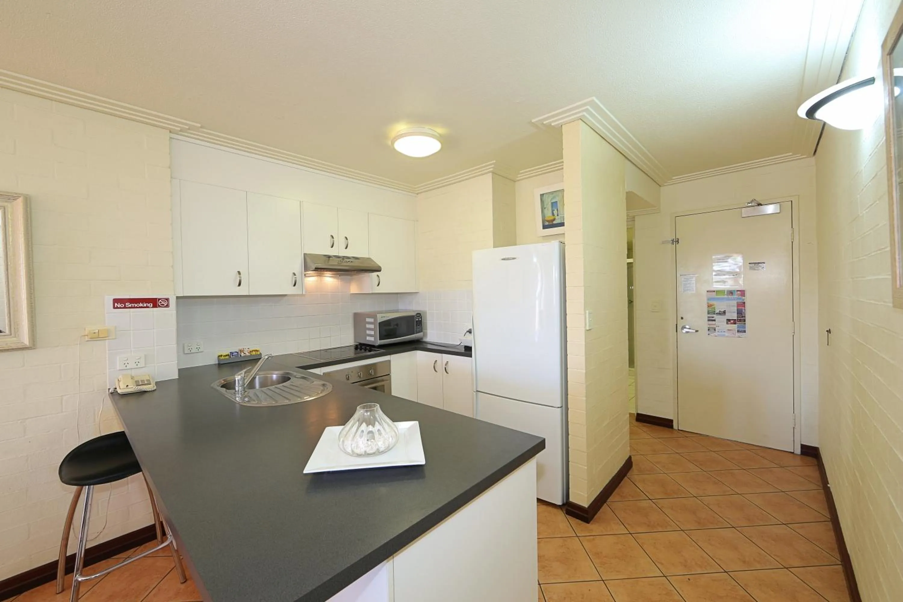 Kitchen or kitchenette in Bargara Shoreline Apartments