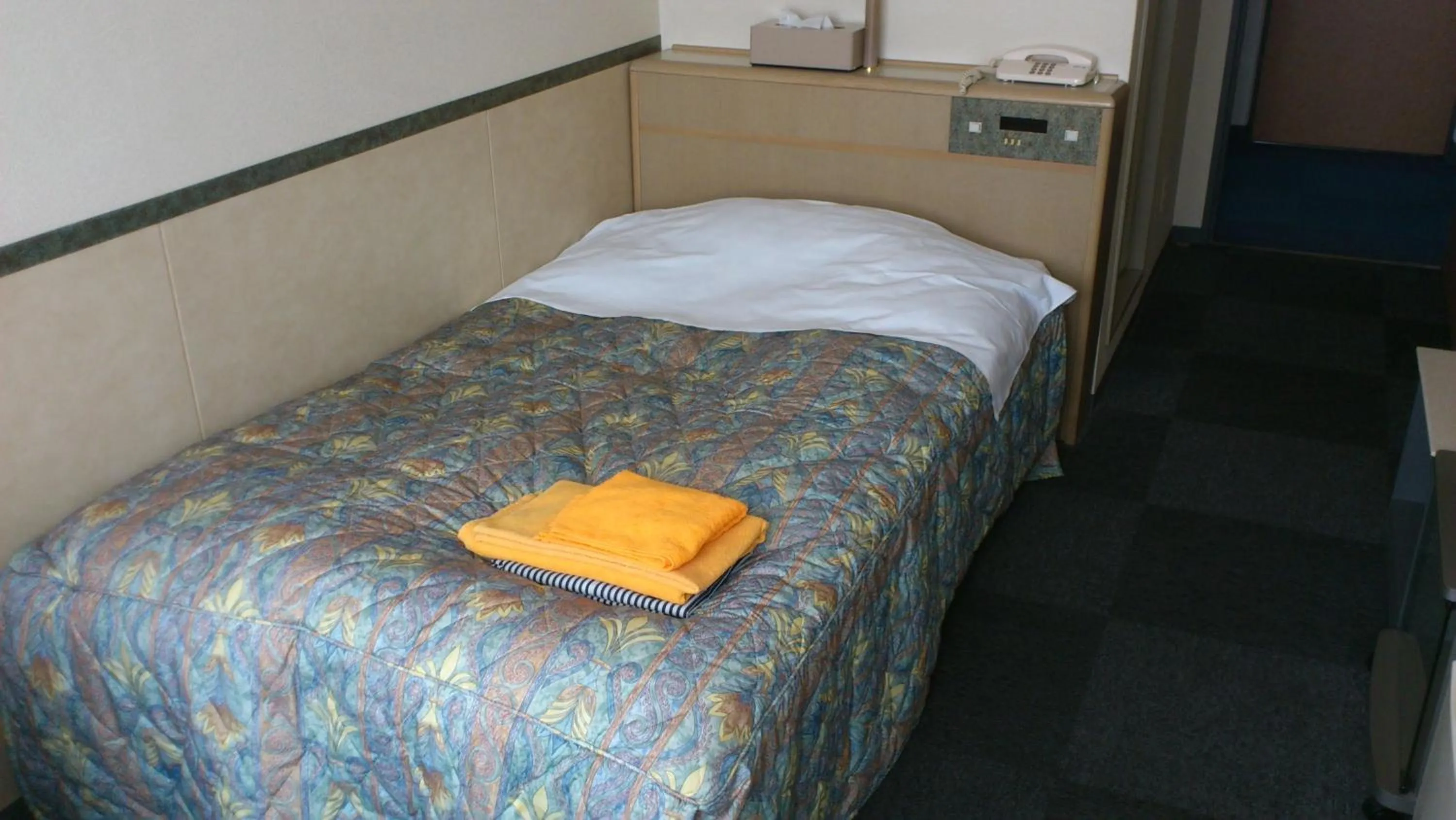 Photo of the whole room, Bed in Business Hotel Motonakano