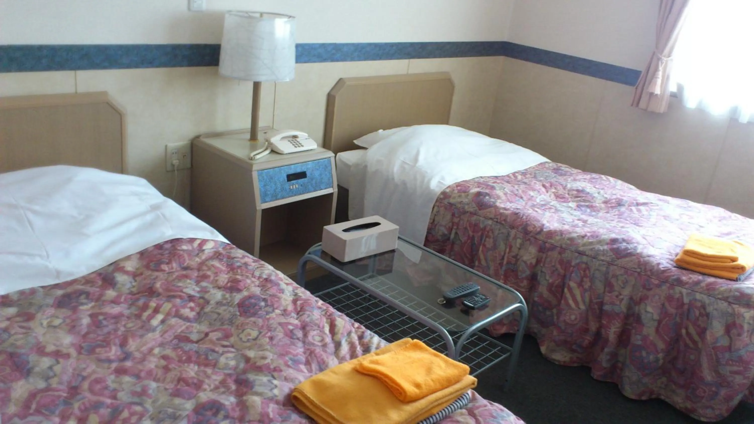 Photo of the whole room, Bed in Business Hotel Motonakano