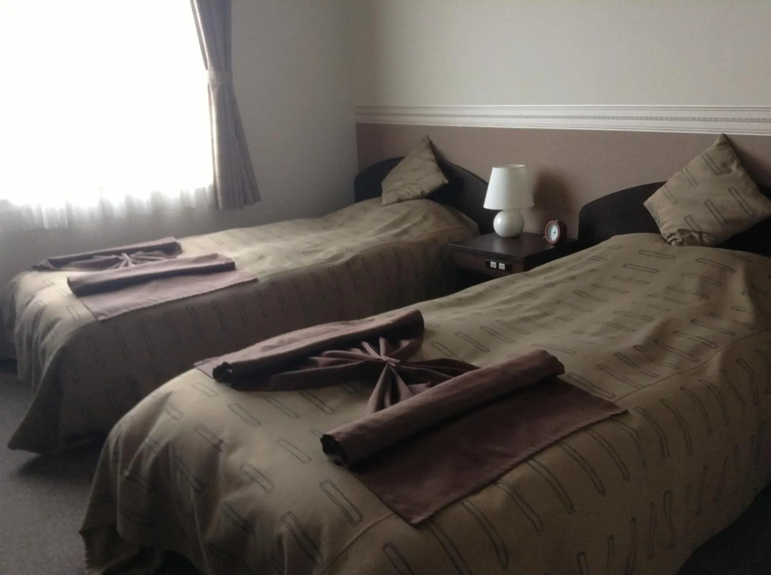 Bed in Petit Hotel Blaneneige Bed in Petit Hotel Blaneneige