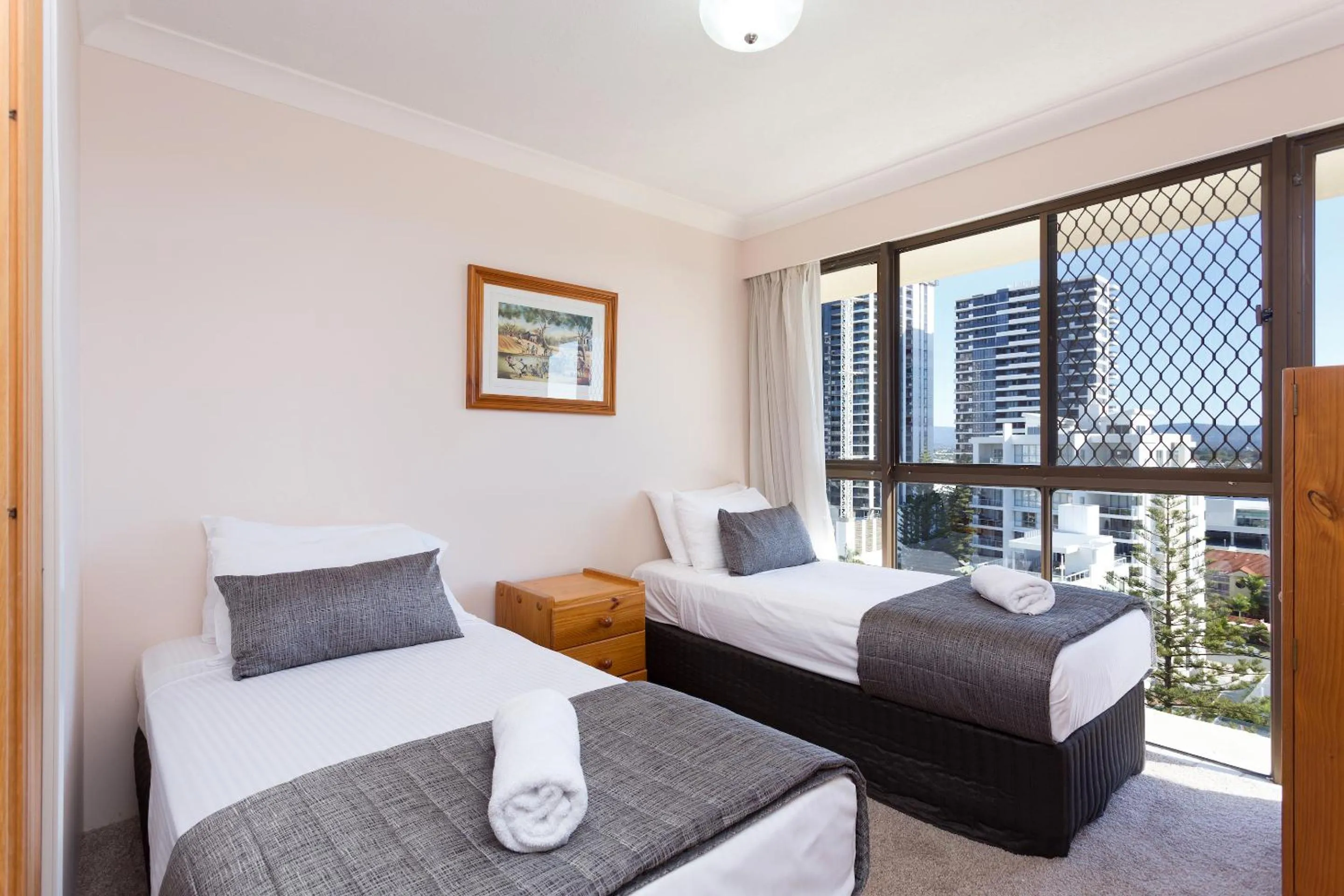 Bedroom, Bed in Capricornia Apartments