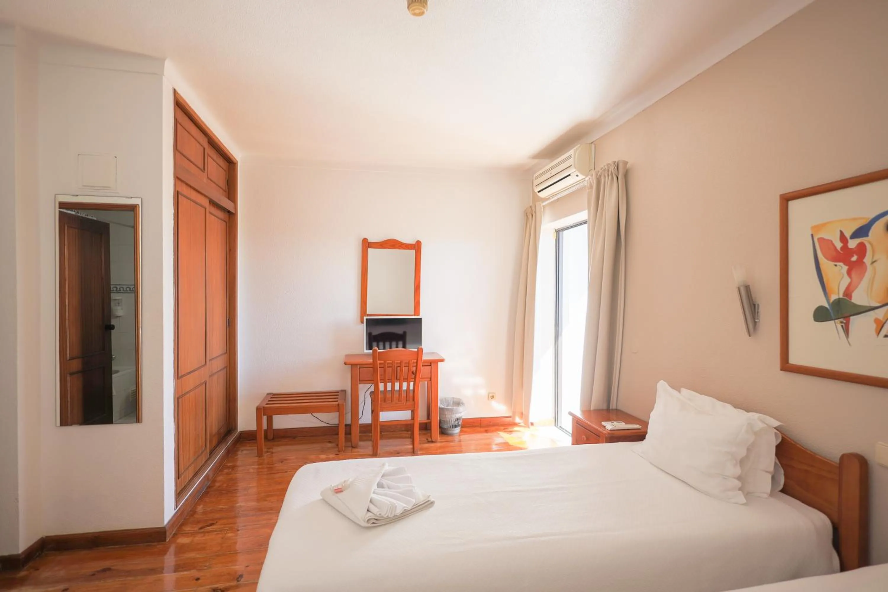 Bed in Portimão Center Hotel by Umbral