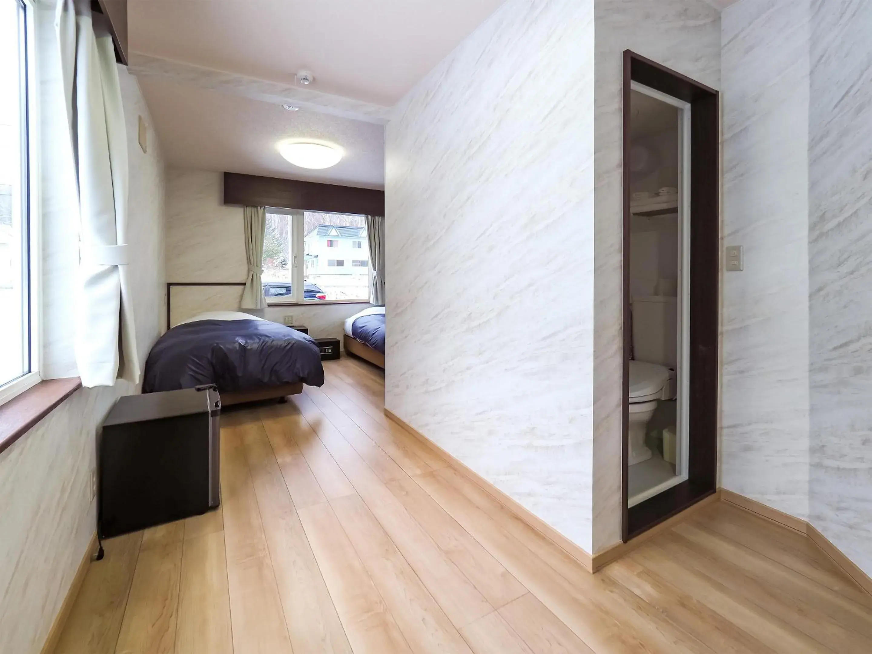 Living room, Bed in Petit Hotel Gracey Tomamu Living room, Bed in Petit Hotel Gracey Tomamu