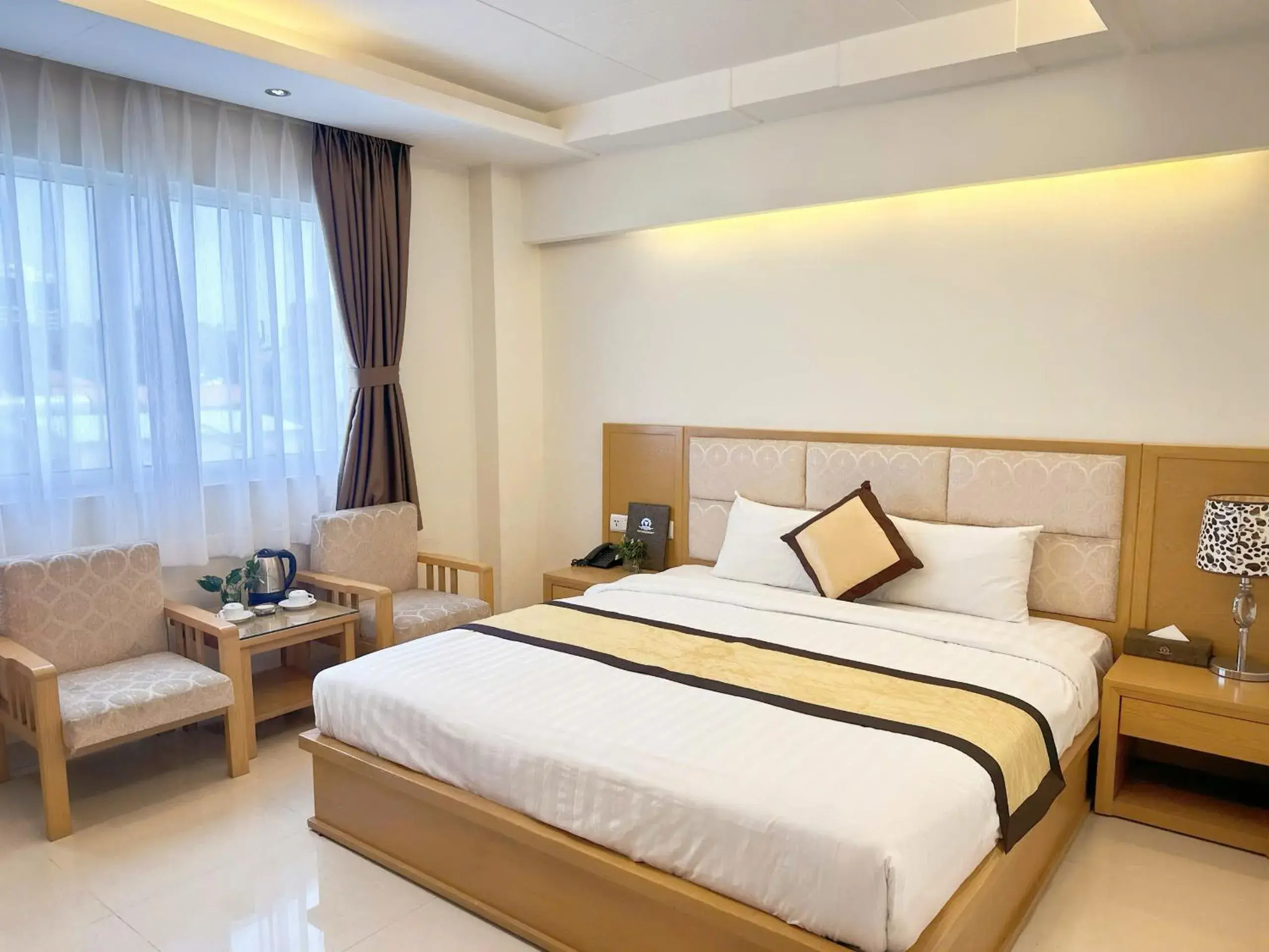 Bed in Vuong Tai Hotel Bed in Vuong Tai Hotel