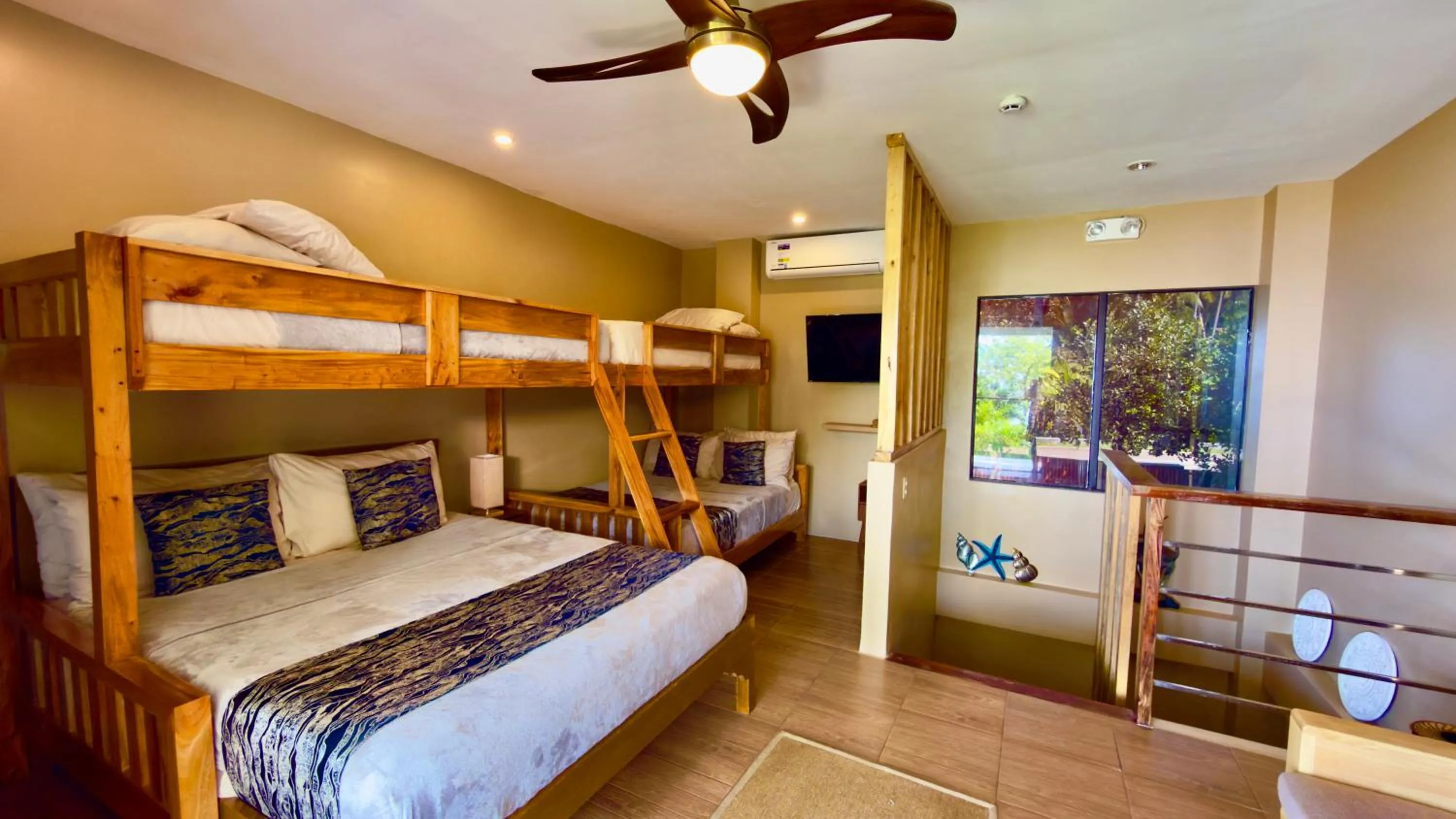 Bed in Southseas Beach Resort and Dive Center