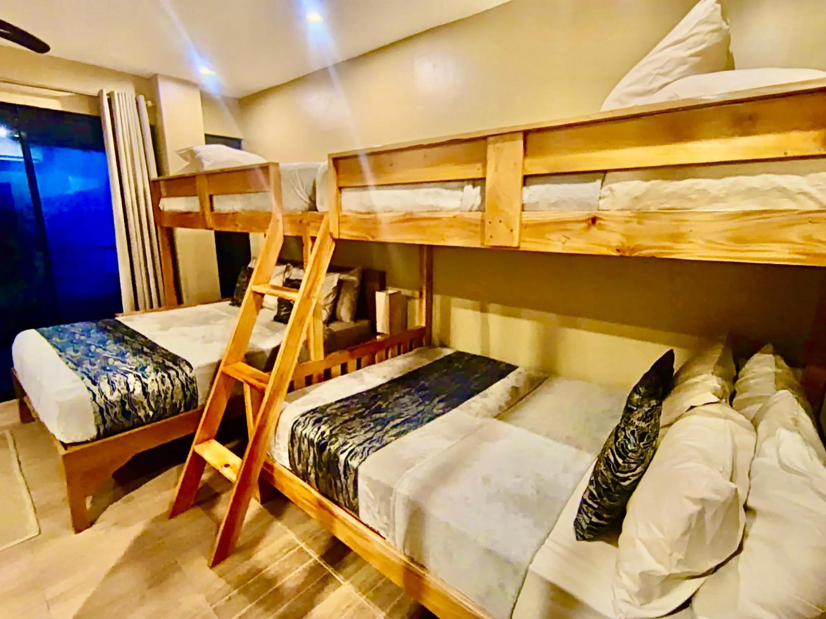 Bed in Southseas Beach Resort and Dive Center