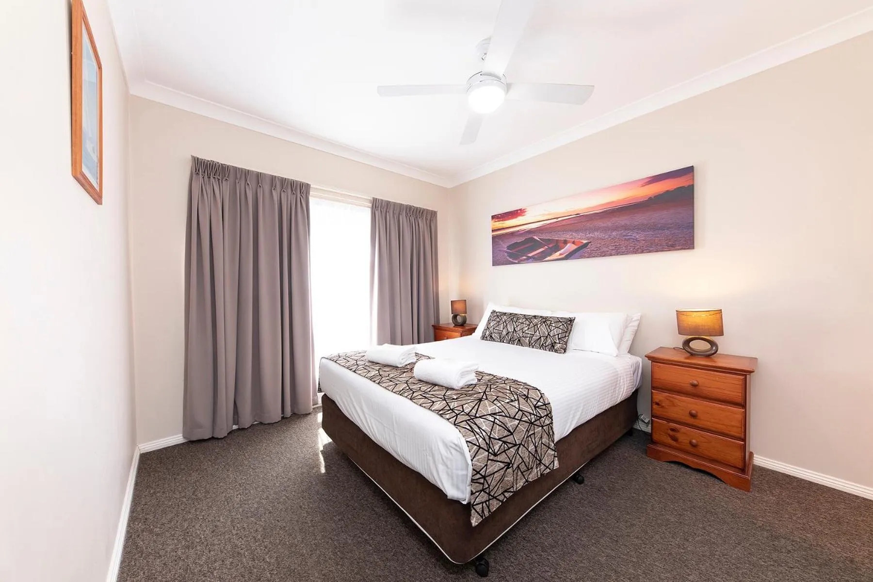 Bed in Meridian Beachside Apartments