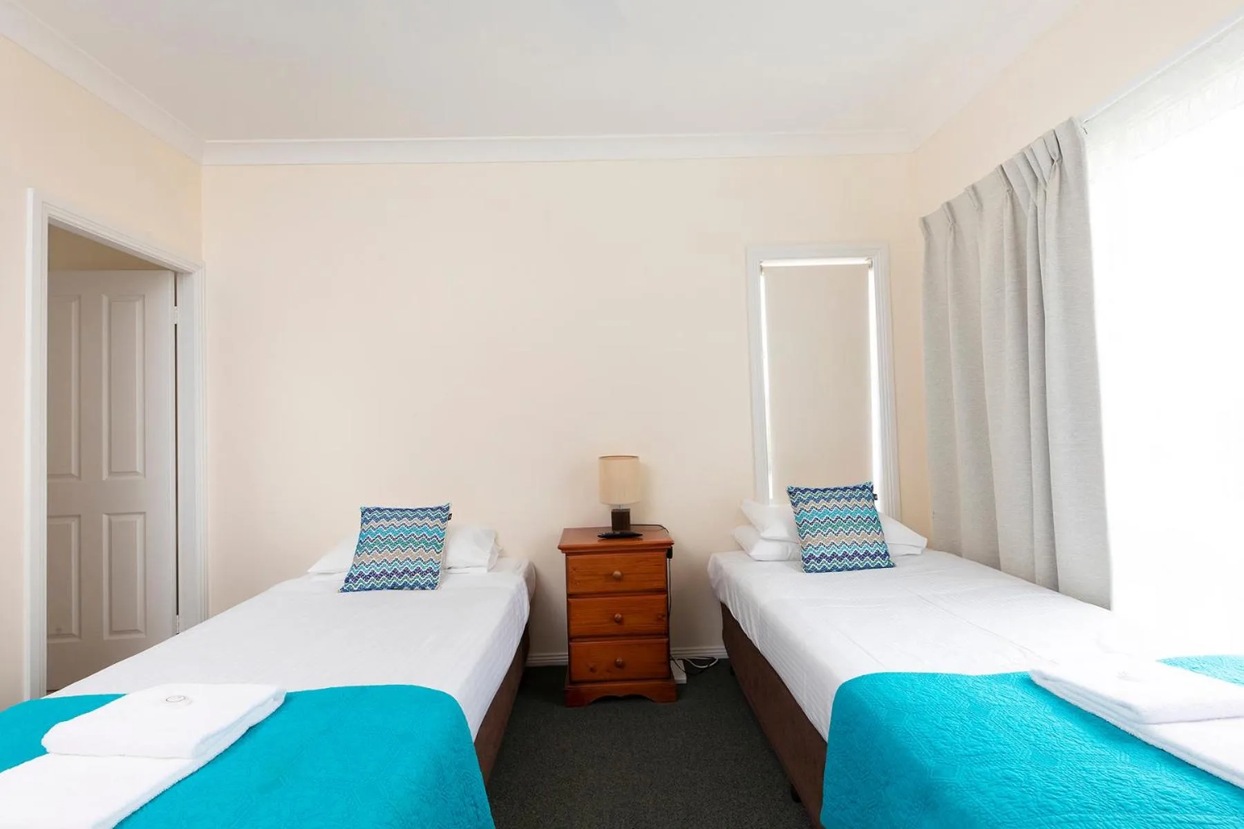 Bed in Meridian Beachside Apartments