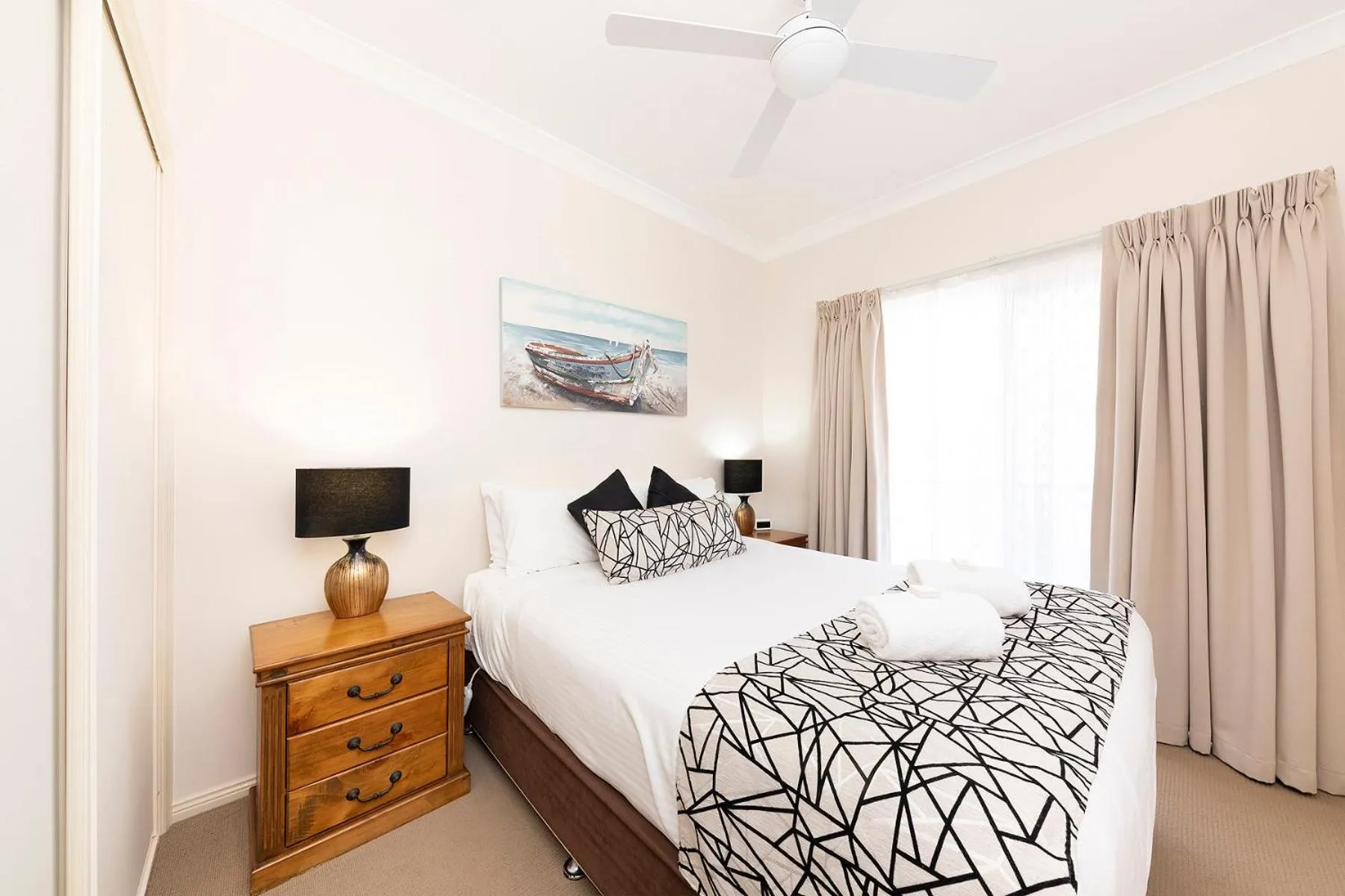 Bed in Meridian Beachside Apartments