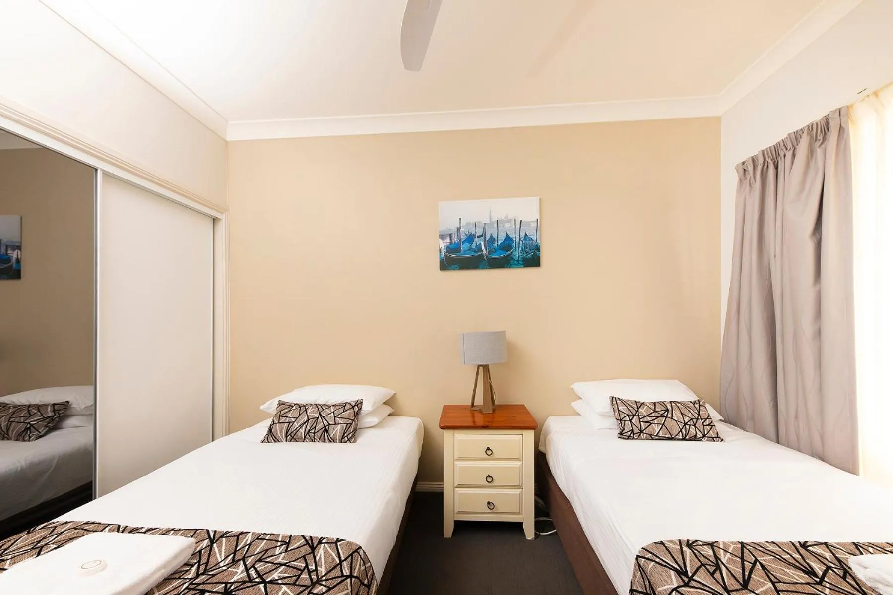 Bed in Meridian Beachside Apartments