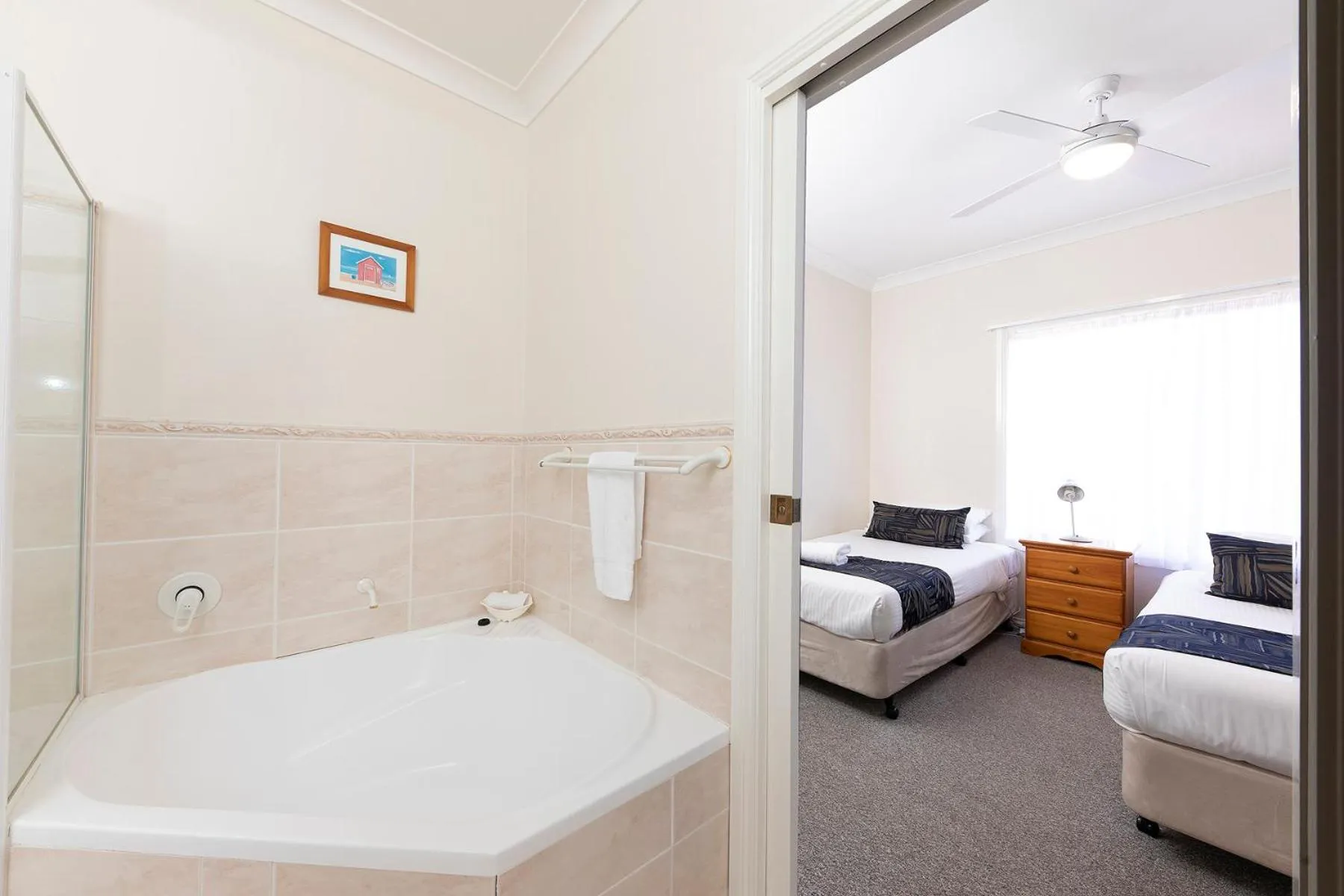 Bed in Meridian Beachside Apartments