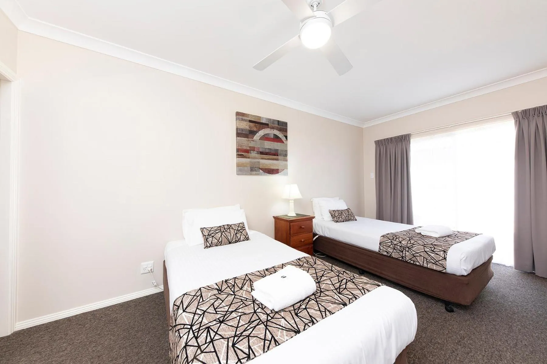 Bed in Meridian Beachside Apartments