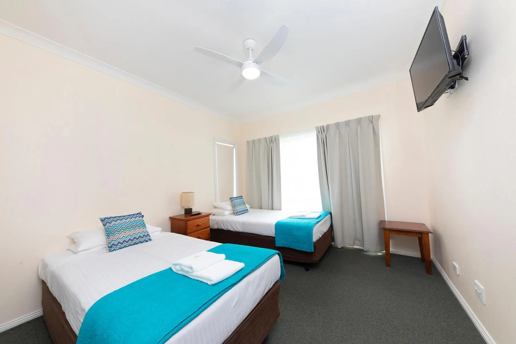 Bed in Meridian Beachside Apartments